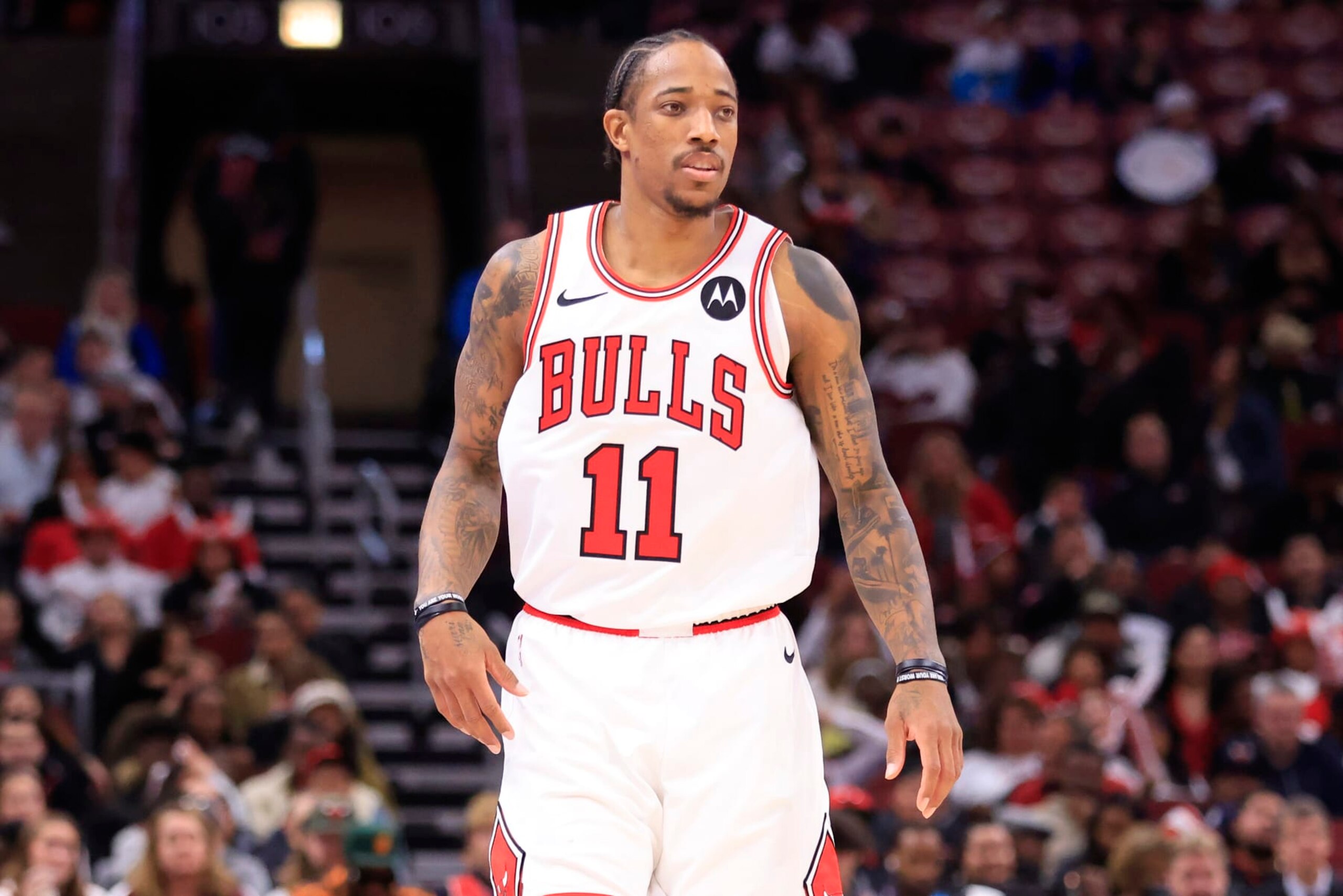 CHICAGO, ILLINOIS - NOVEMBER 20: DeMar DeRozan #11 of the Chicago Bulls looks on in the game against the Miami Heat at the United Center on November 20, 2023 in Chicago, Illinois. NOTE TO USER: User expressly acknowledges and agrees that, by downloading and or using this photograph, User is consenting to the terms and conditions of the Getty Images License Agreement. (Photo by Justin Casterline/Getty Images)