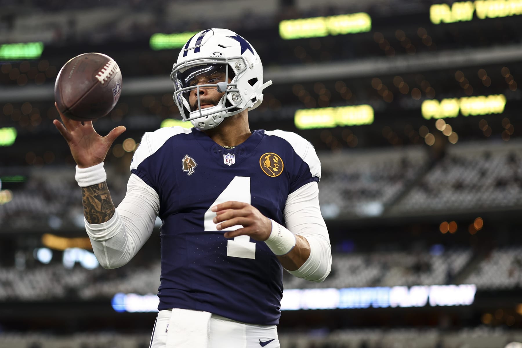 ARLINGTON, TX - NOVEMBER 23: Dak Prescott #4 of the Dallas Cowboys warms up prior to an NFL football game against the Washington Commanders at AT&T Stadium on November 23, 2023 in Arlington, Texas. (Photo by Kevin Sabitus/Getty Images)