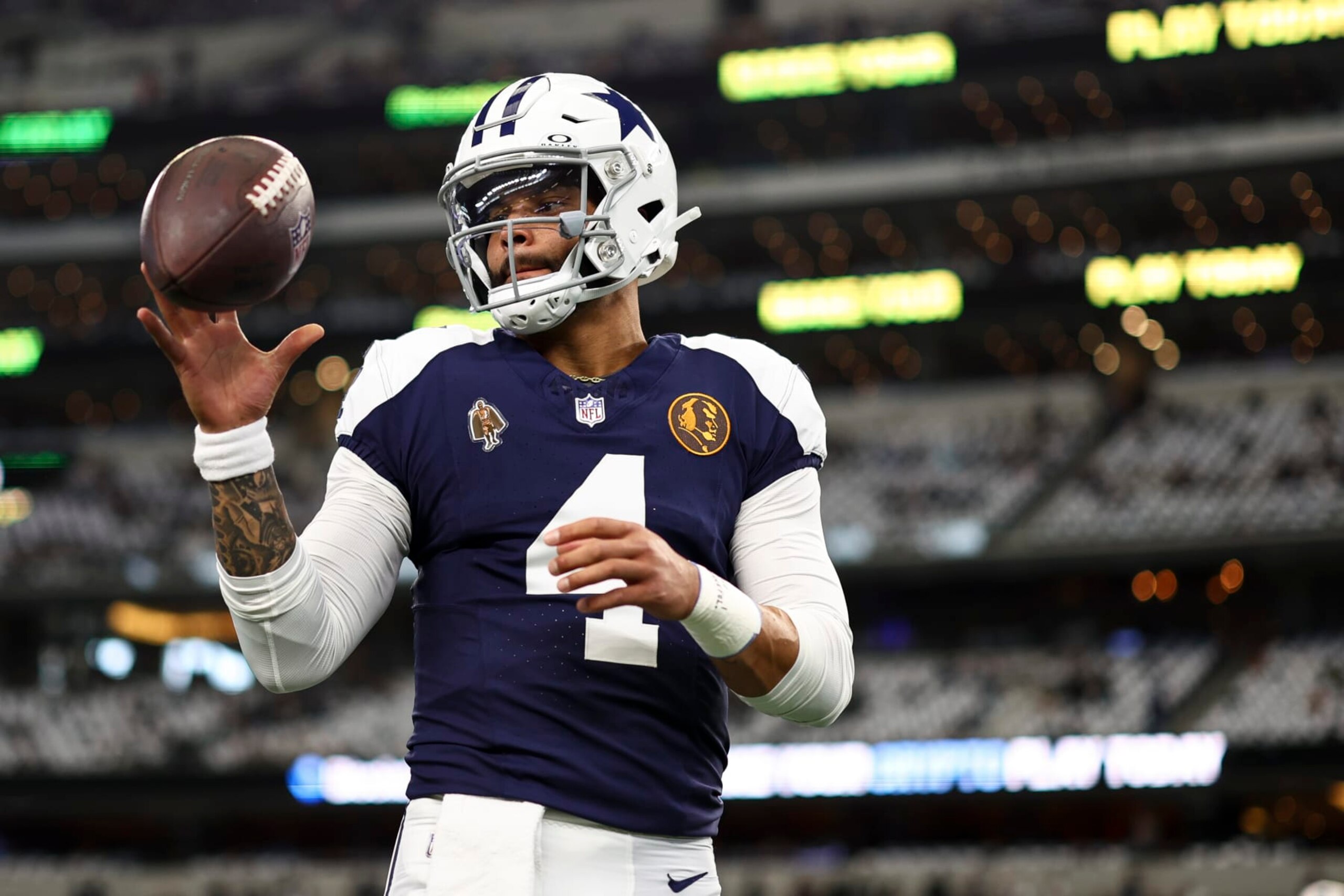 ARLINGTON, TX - NOVEMBER 23: Dak Prescott #4 of the Dallas Cowboys warms up prior to an NFL football game against the Washington Commanders at AT&T Stadium on November 23, 2023 in Arlington, Texas. (Photo by Kevin Sabitus/Getty Images)