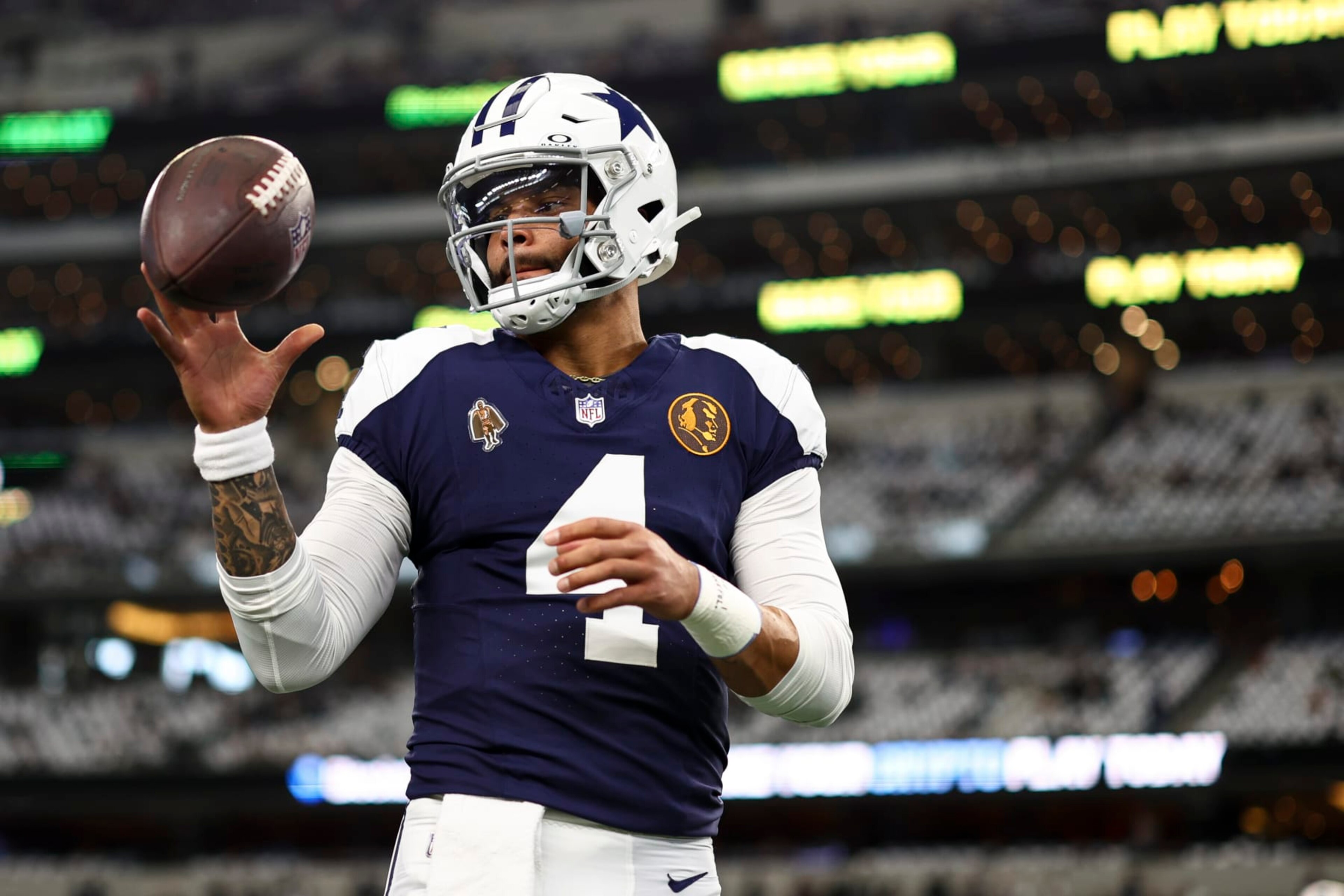 ARLINGTON, TX - NOVEMBER 23: Dak Prescott #4 of the Dallas Cowboys warms up prior to an NFL football game against the Washington Commanders at AT&T Stadium on November 23, 2023 in Arlington, Texas. (Photo by Kevin Sabitus/Getty Images) ARLINGTON, TX - NOVEMBER 23: Dak Prescott #4 of the Dallas Cowboys warms up prior to an NFL football game against the Washington Commanders at AT&T Stadium on November 23, 2023 in Arlington, Texas. (Photo by Kevin Sabitus/Getty Images)
