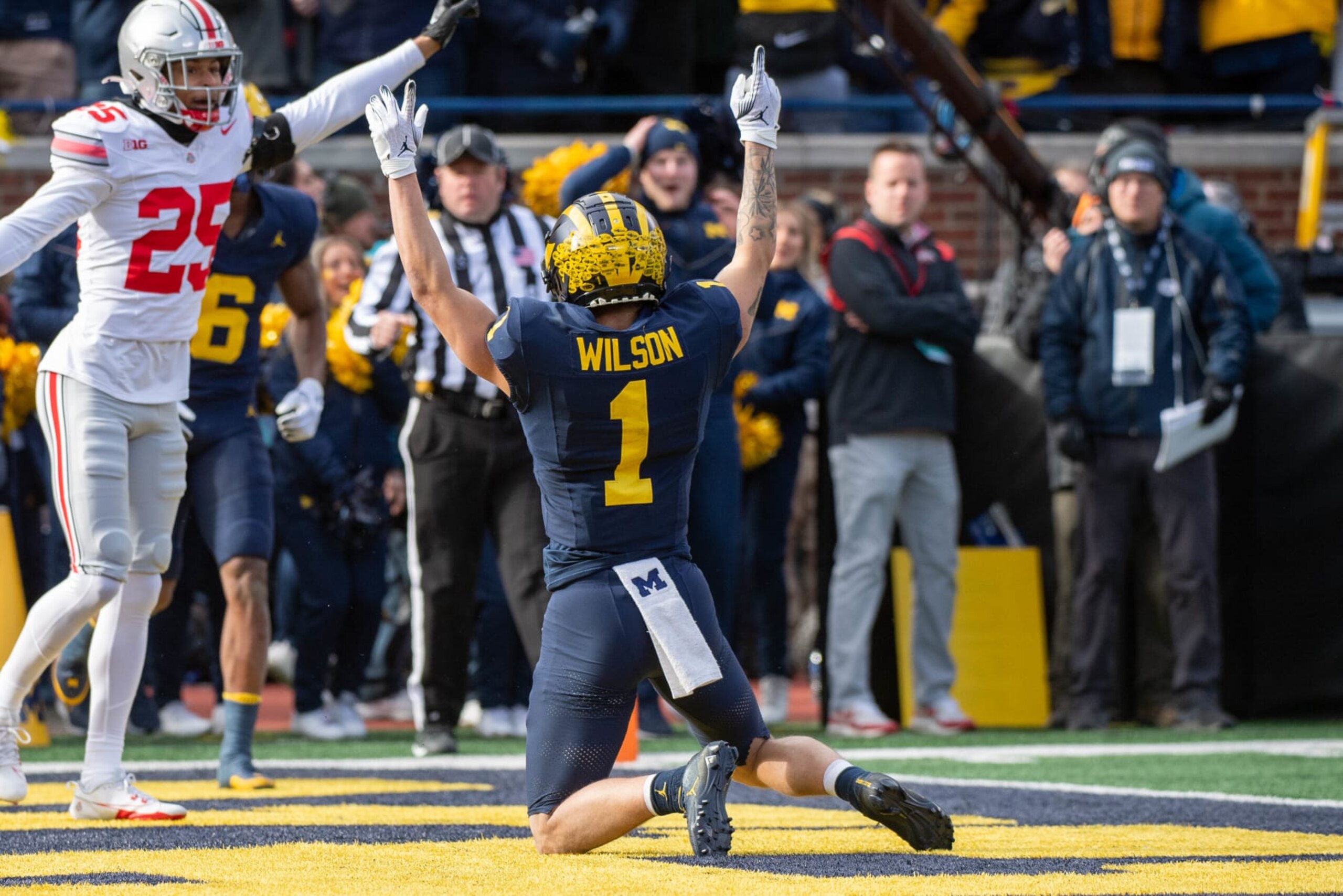 ANN ARBOR, MICHIGAN - NOVEMBER 25: Roman Wilson #1 of the Michigan Wolverines signals a touchdown after scoring during the first half of a college football game against the Ohio State Buckeyes at Michigan Stadium on November 25, 2023 in Ann Arbor, Michigan. (Photo by Aaron J. Thornton/Getty Images)