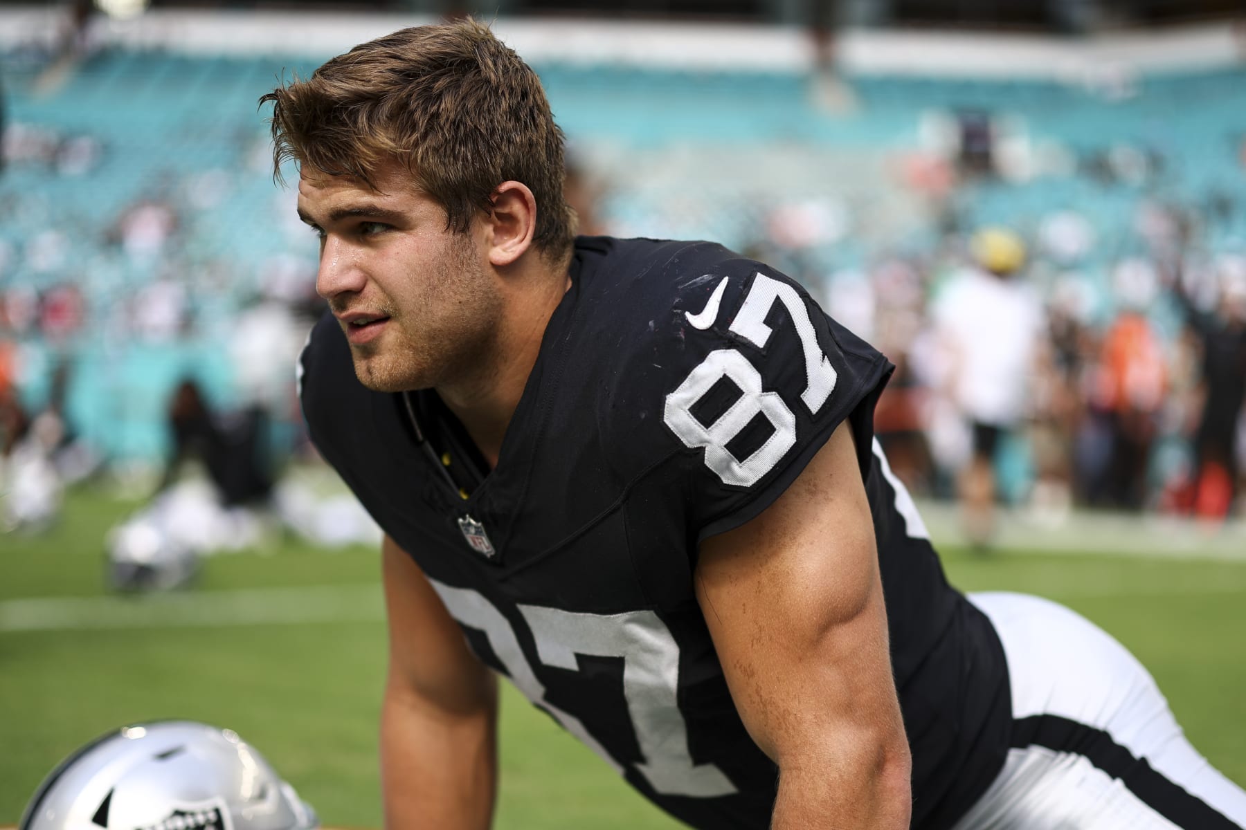 MIAMI GARDENS, FL - NOVEMBER 19: Michael Mayer #87 of the Las Vegas Raiders stretches prior to an NFL football game against the Miami Dolphins at Hard Rock Stadium on November 19, 2023 in Miami Gardens, Florida. (Photo by Kevin Sabitus/Getty Images)