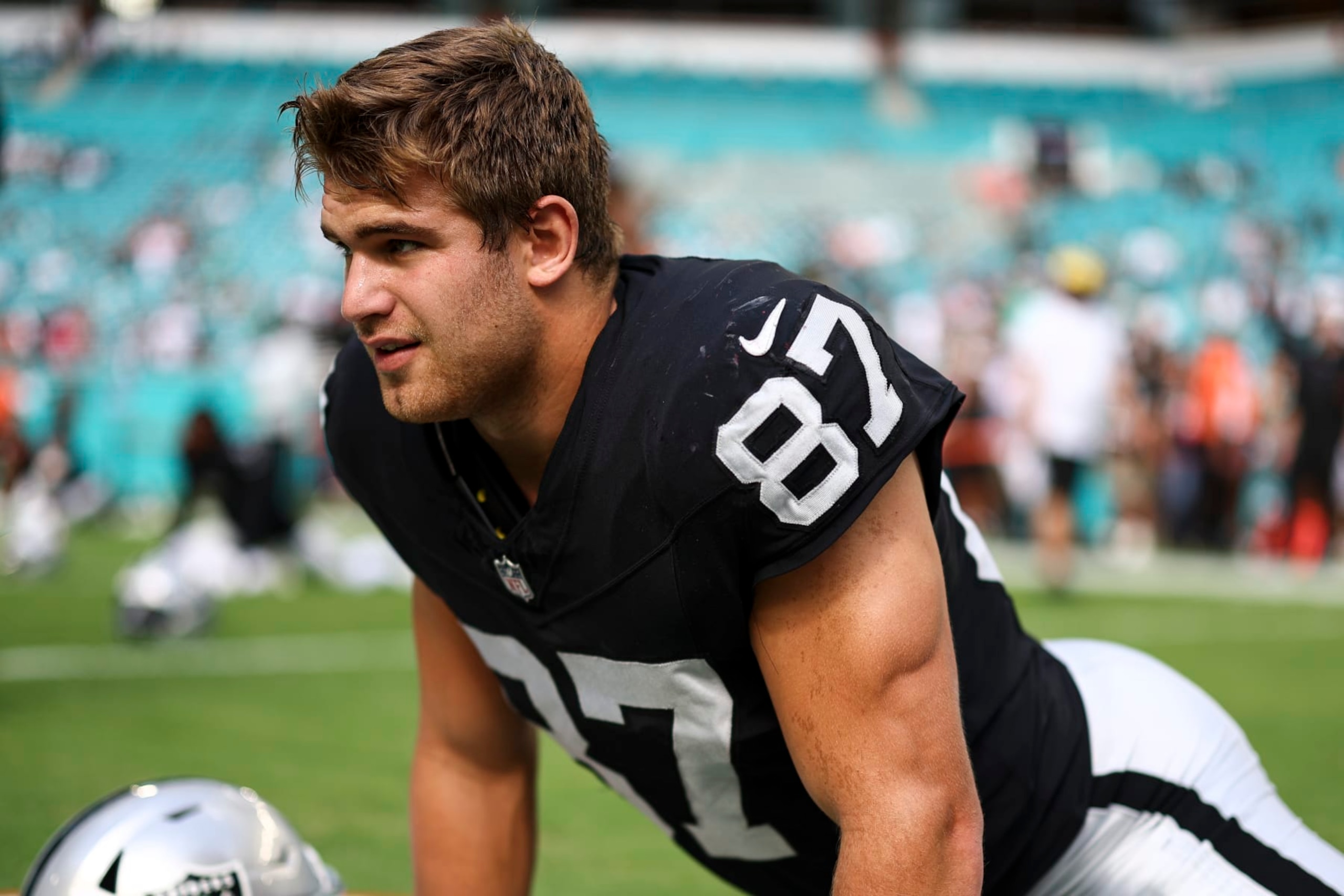 MIAMI GARDENS, FL - NOVEMBER 19: Michael Mayer #87 of the Las Vegas Raiders stretches prior to an NFL football game against the Miami Dolphins at Hard Rock Stadium on November 19, 2023 in Miami Gardens, Florida. (Photo by Kevin Sabitus/Getty Images)