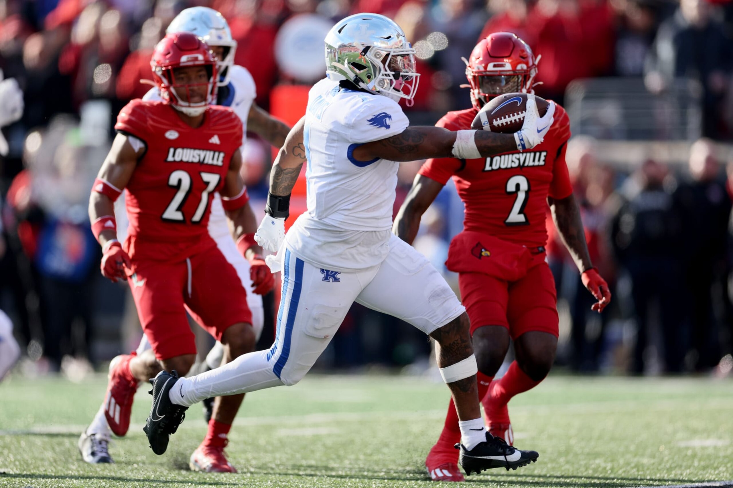LOUISVILLE, KENTUCKY - NOVEMBER 25:  Ray Davis #1 of the Kentucky Wildcats runs for a touchdown against the Louisville Cardinals in the second half at L&N Stadium on November 25, 2023 in Louisville, Kentucky. (Photo by Andy Lyons/Getty Images)