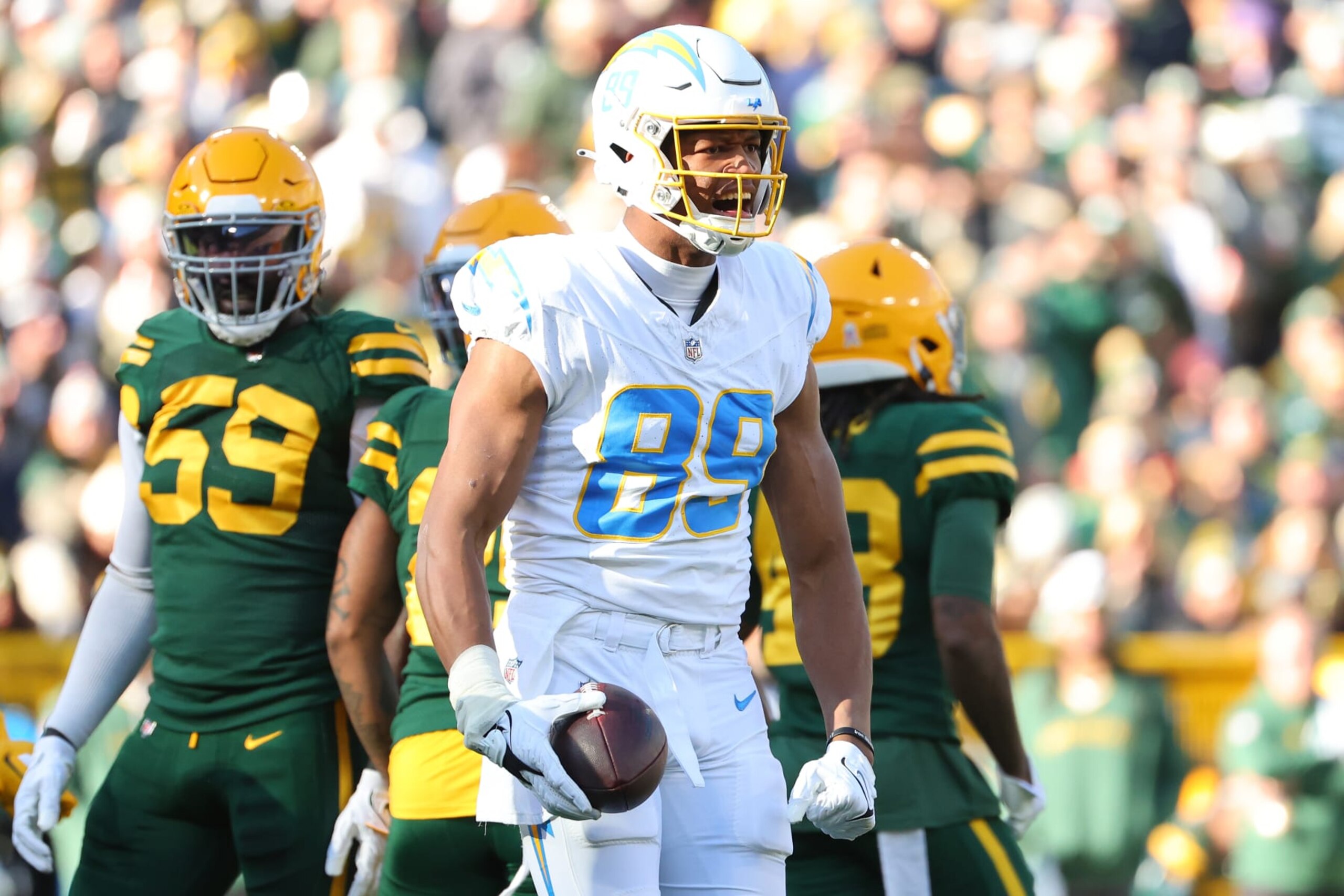 GREEN BAY, WISCONSIN - NOVEMBER 19: Donald Parham Jr. #89 of the Los Angeles Chargers celebrates after running for a first down in the first quarter against the Green Bay Packers at Lambeau Field on November 19, 2023 in Green Bay, Wisconsin. (Photo by Stacy Revere/Getty Images)