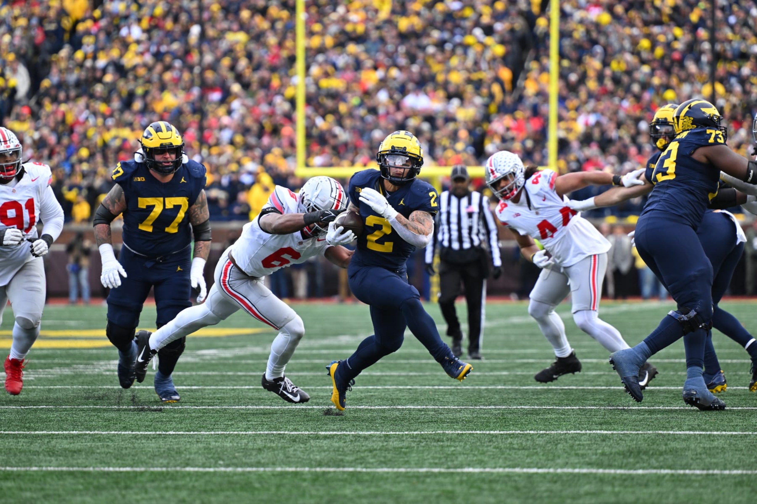 ANN ARBOR, MI - NOVEMBER 25: Michigan Wolverines running back Blake Corum (2) breaks free up the middle for a long touchdown run during the Michigan Wolverines versus the Ohio State Buckeyes on Saturday November 25, 2023 at Michigan Stadium in Ann Arbor, MI. (Photo by Steven King/Icon Sportswire via Getty Images)