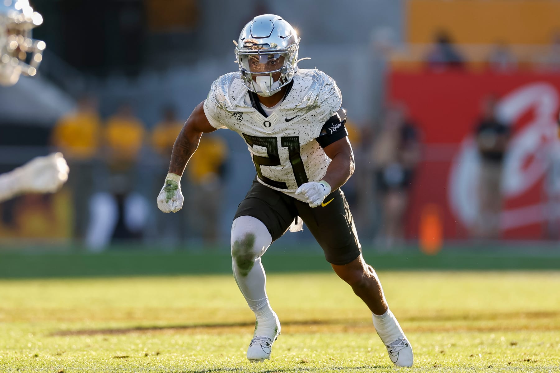 TEMPE, ARIZONA - NOVEMBER 18: Cole Martin #21 of the Oregon Ducks rushes during a game against the Arizona State Sun Devils at Mountain America Stadium on November 18, 2023 in Tempe, Arizona. (Photo by Brandon Sloter/Image Of Sport/Getty Images)