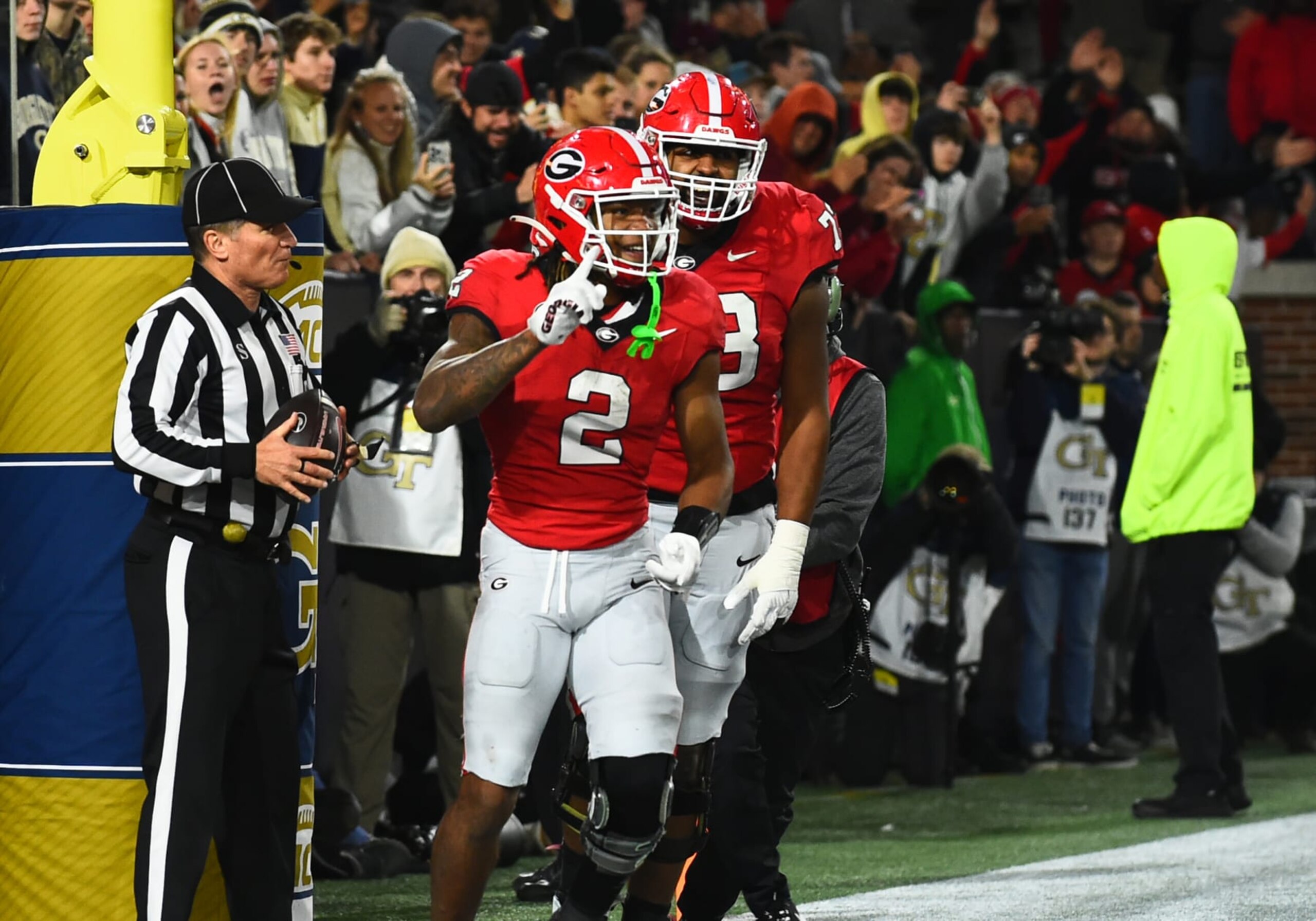 ATLANTA, GA - NOVEMBER 25: Georgia Bulldogs Running Back Kendall Milton (2) celebrates a touchdown during the college football game between the Georgia Bulldogs and the Georgia Tech Yellow Jackets on November 25, 2023, at Bobby Dodd Stadium in Atlanta, GA. (Photo by Jeffrey Vest/Icon Sportswire via Getty Images)