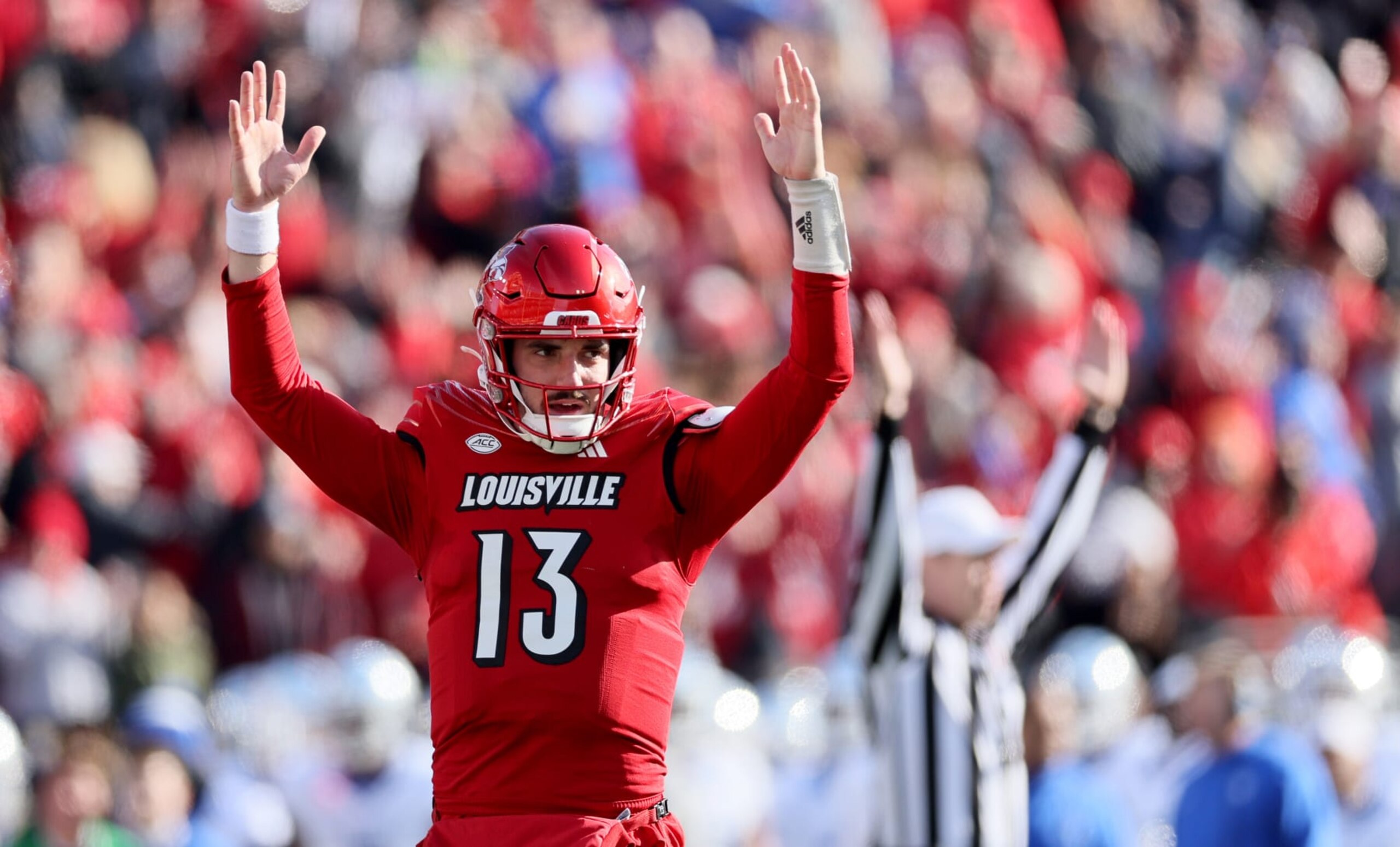 LOUISVILLE, KENTUCKY - NOVEMBER 25: Jack Plummer #13 of the Louisville Cardinals celebrates a touchdown against the Kentucky Wildcats in the second half at L&N Stadium on November 25, 2023 in Louisville, Kentucky. (Photo by Andy Lyons/Getty Images) LOUISVILLE, KENTUCKY - NOVEMBER 25: Jack Plummer #13 of the Louisville Cardinals celebrates a touchdown against the Kentucky Wildcats in the second half at L&N Stadium on November 25, 2023 in Louisville, Kentucky. (Photo by Andy Lyons/Getty Images)