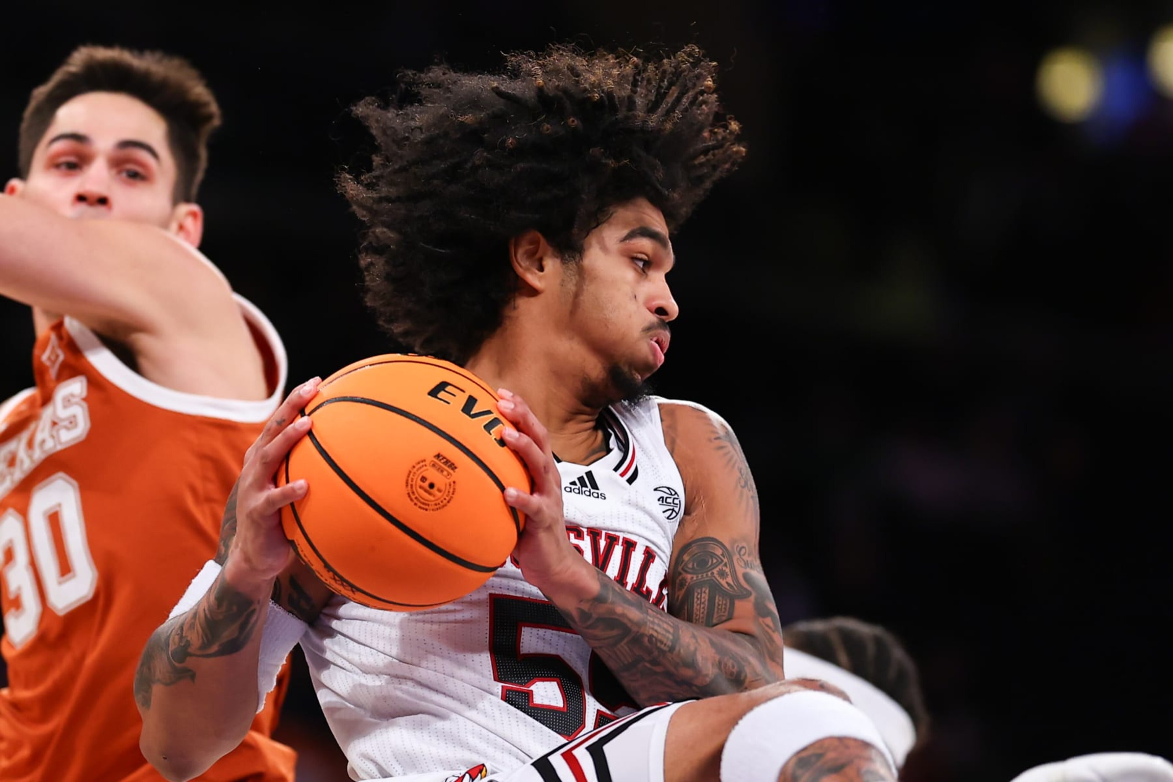 NEW YORK, NY - NOVEMBER 19:  Skyy Clark #55 of the Louisville Cardinals during the Empire Classic college basketball game against the Texas Longhorns on November 19, 2023 at Madison Square Garden, New York, New York.   (Photo by Rich Graessle/Icon Sportswire via Getty Images)