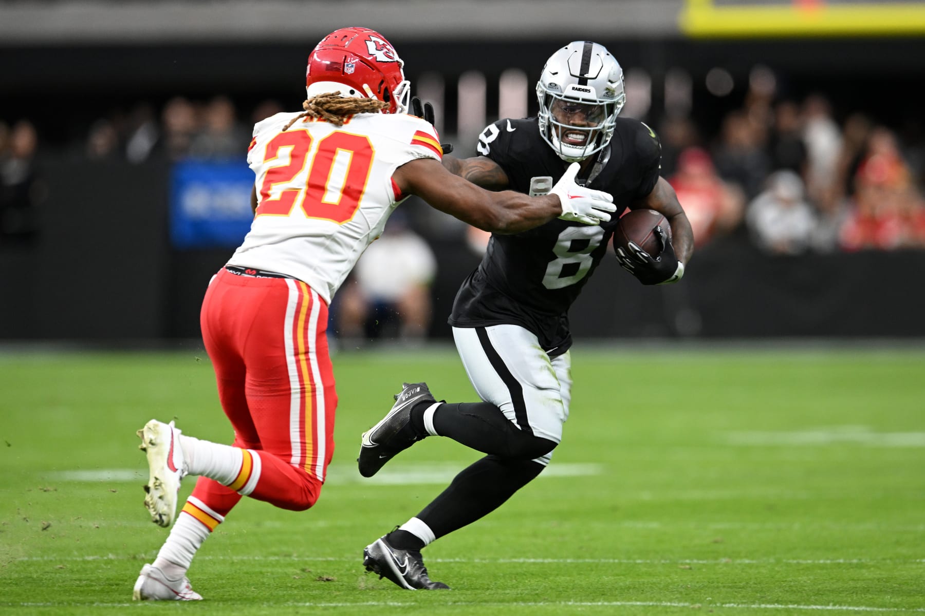Chiefs S Justin Reid tries to tackle Raiders RB Josh Jacobs
