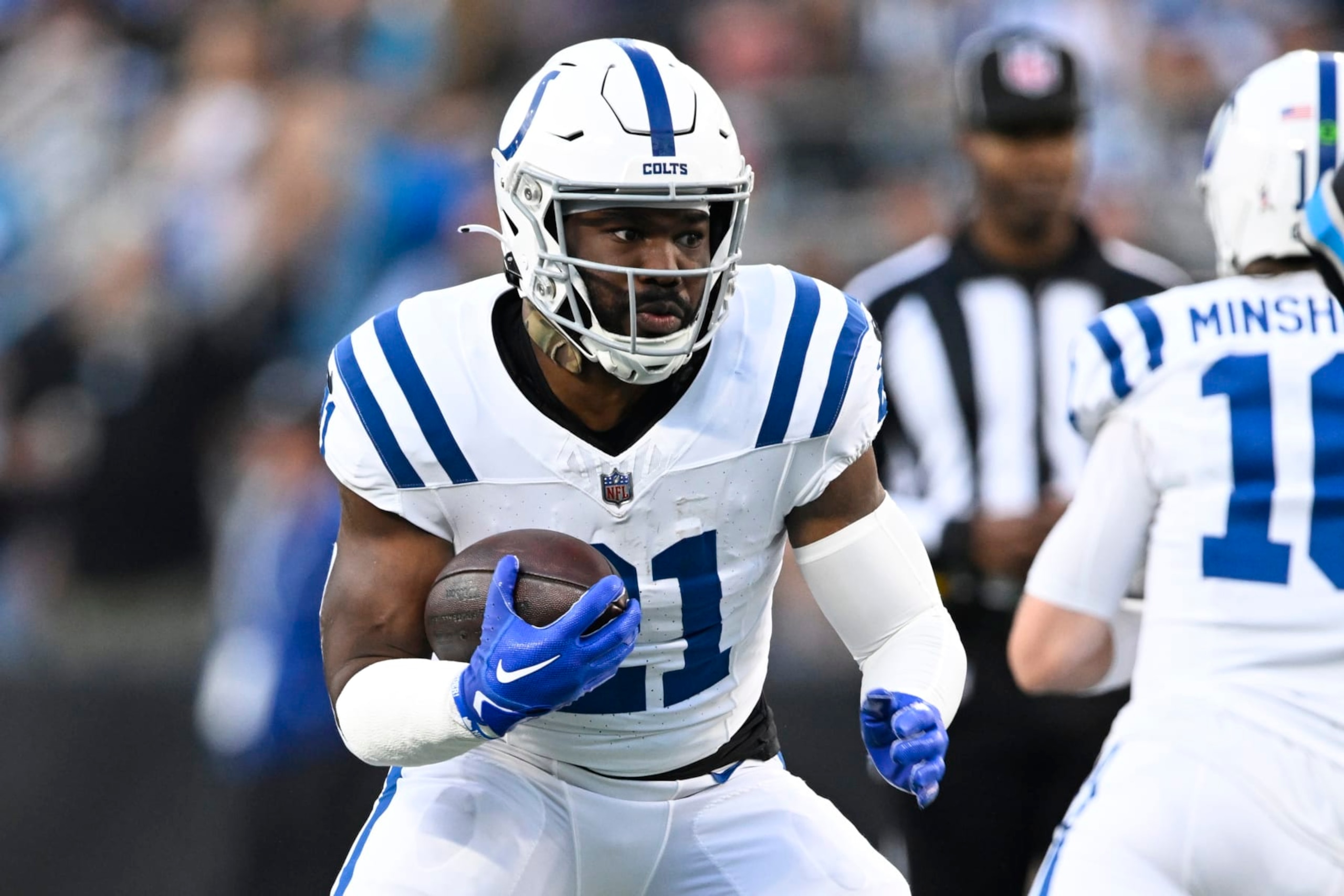 CHARLOTTE, NORTH CAROLINA - NOVEMBER 05: Zack Moss #21 of the Indianapolis Colts runs with the ball during the first quarter of the game against the Carolina Panthers at Bank of America Stadium on November 05, 2023 in Charlotte, North Carolina. (Photo by Eakin Howard/Getty Images)
