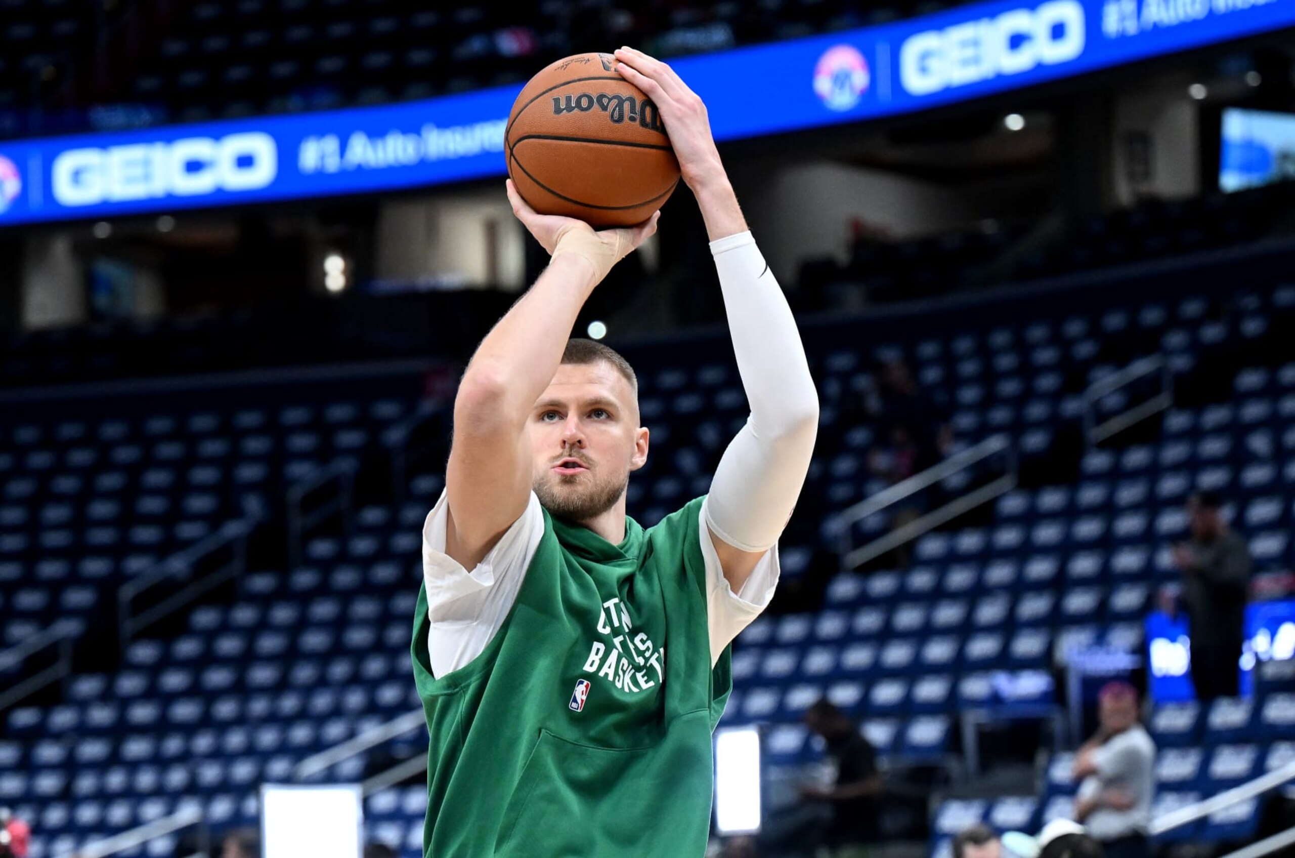 WASHINGTON, DC - OCTOBER 30: Kristaps Porzingis #8 of the Boston Celtics warms up before the game against the Washington Wizards at Capital One Arena on October 30, 2023 in Washington, DC.  NOTE TO USER: User expressly acknowledges and agrees that, by downloading and or using this photograph, User is consenting to the terms and conditions of the Getty Images License Agreement.  (Photo by G Fiume/Getty Images)