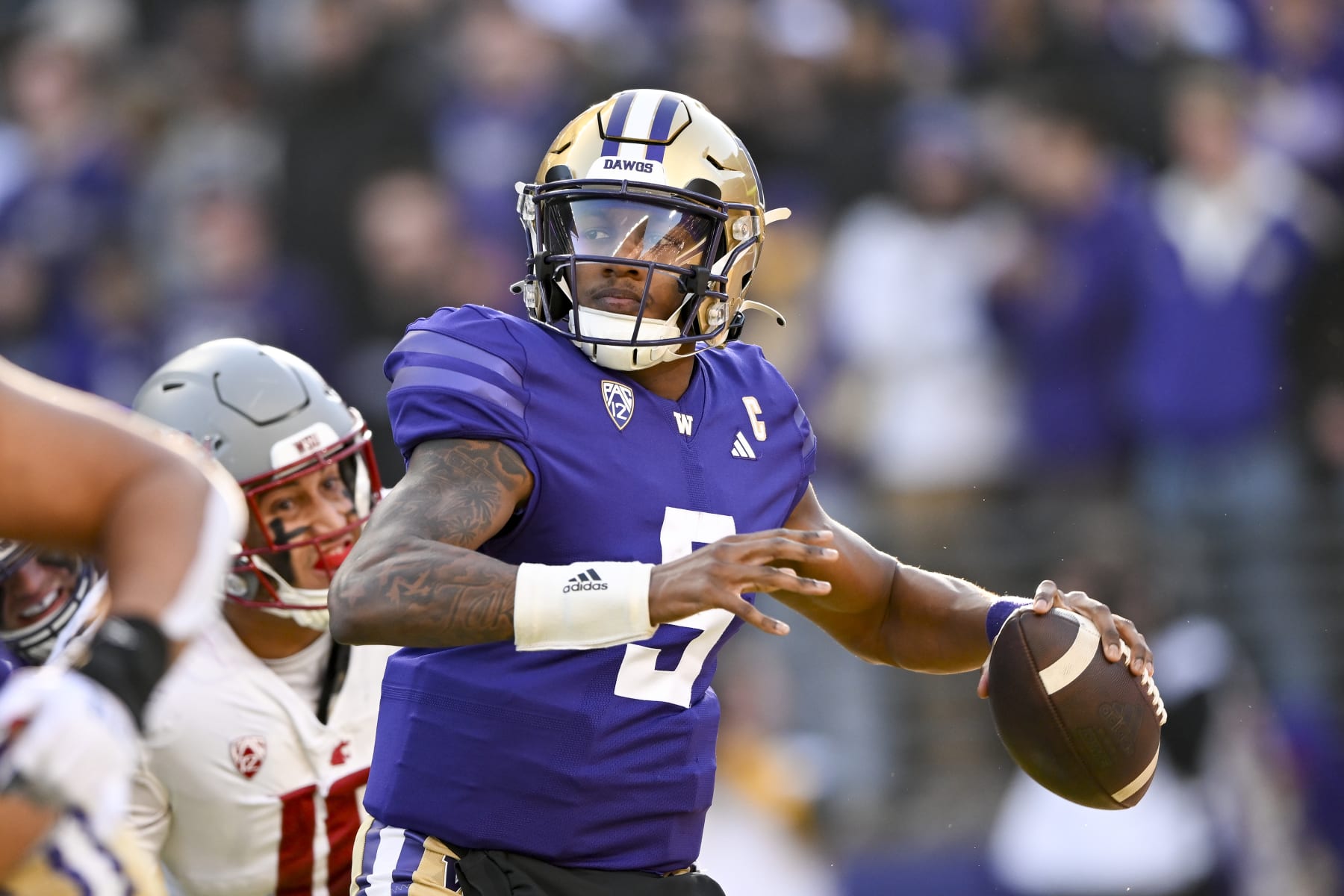 SEATTLE, WASHINGTON - NOVEMBER 25: Michael Penix Jr. #9 of the Washington Huskies throws the ball during the second quarter against the Washington State Cougars  at Husky Stadium on November 25, 2023 in Seattle, Washington. (Photo by Alika Jenner/Getty Images)