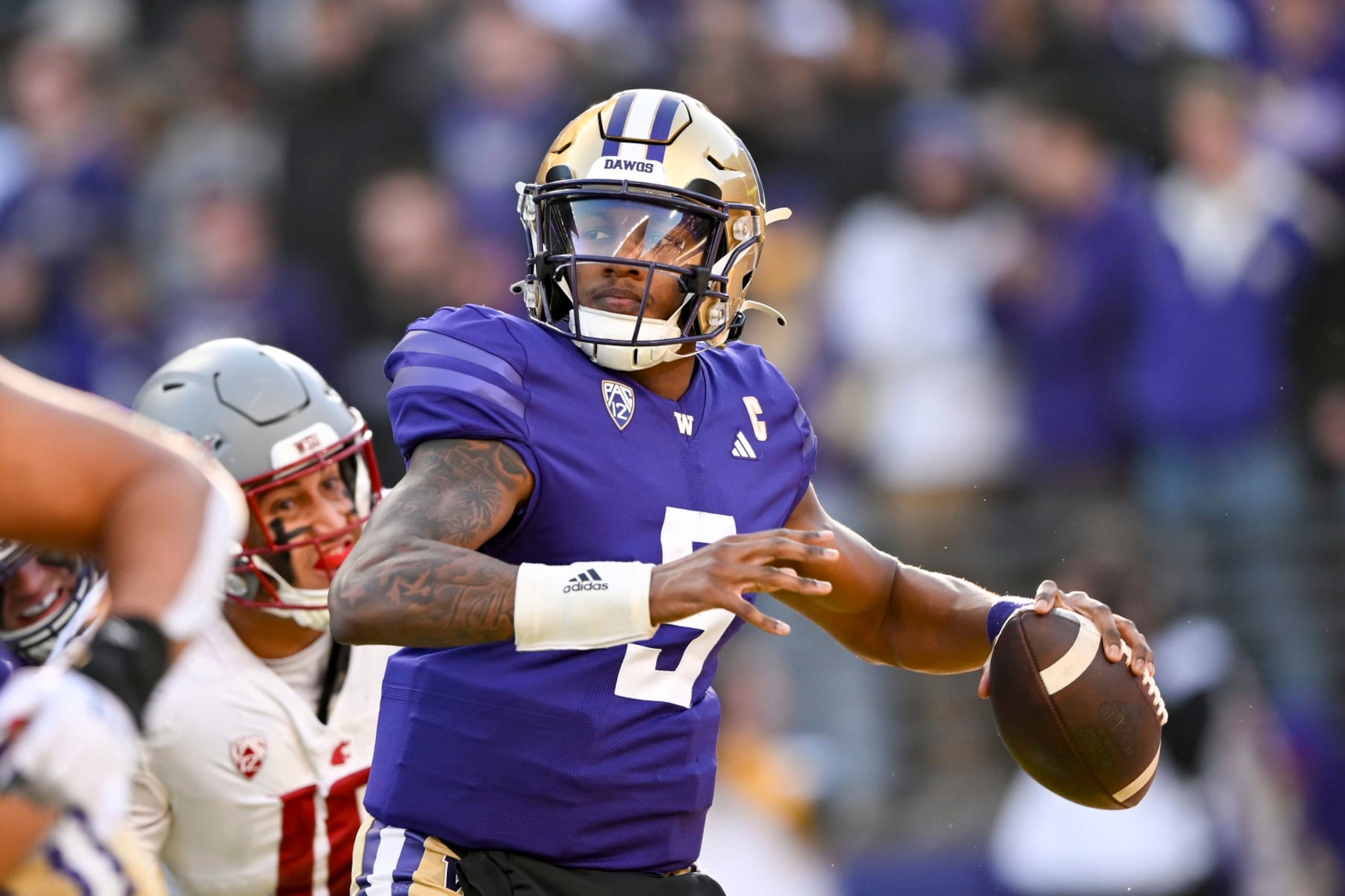 SEATTLE, WASHINGTON - NOVEMBER 25: Michael Penix Jr. #9 of the Washington Huskies throws the ball during the second quarter against the Washington State Cougars at Husky Stadium on November 25, 2023 in Seattle, Washington. (Photo by Alika Jenner/Getty Images) SEATTLE, WASHINGTON - NOVEMBER 25: Michael Penix Jr. #9 of the Washington Huskies throws the ball during the second quarter against the Washington State Cougars at Husky Stadium on November 25, 2023 in Seattle, Washington. (Photo by Alika Jenner/Getty Images)