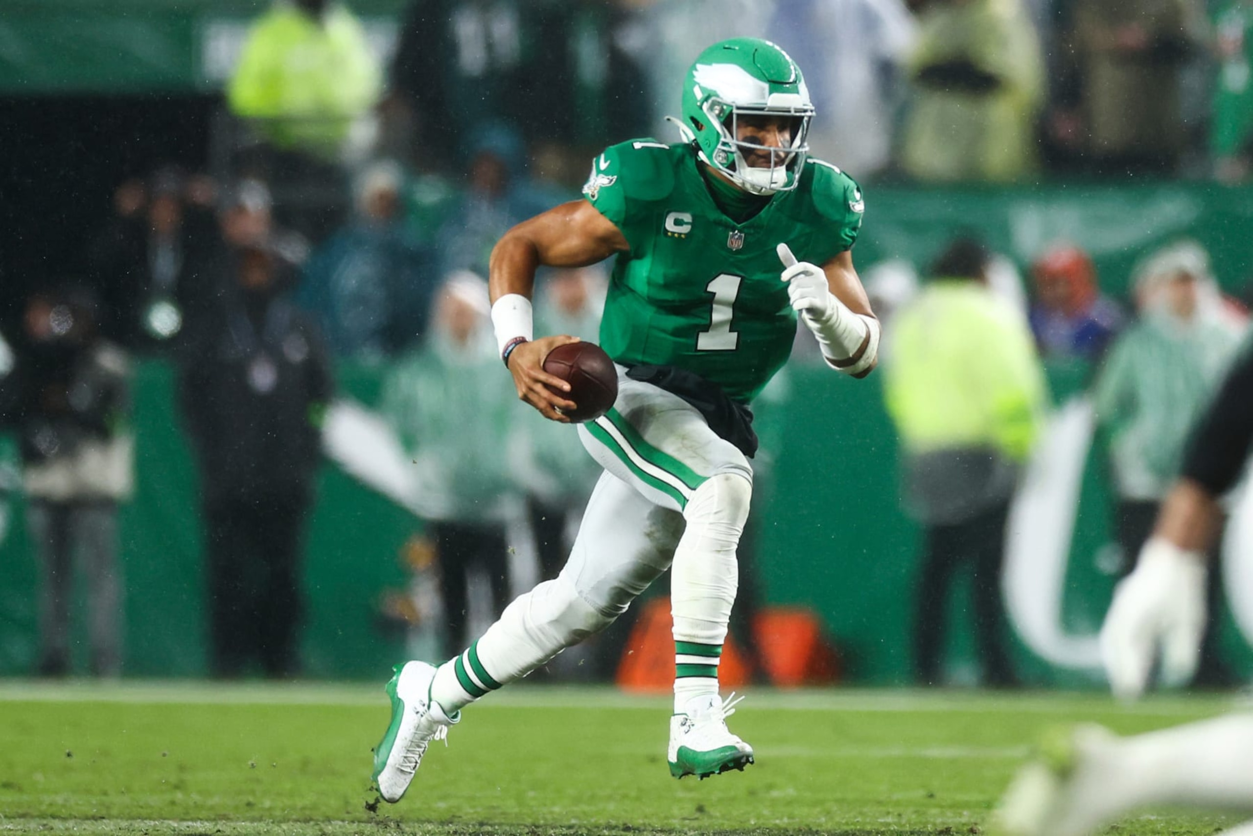 PHILADELPHIA, PENNSYLVANIA - NOVEMBER 26: Jalen Hurts #1 of the Philadelphia Eagles runs the ball during the first quarter against the Buffalo Bills at Lincoln Financial Field on November 26, 2023 in Philadelphia, Pennsylvania. (Photo by Tim Nwachukwu/Getty Images)