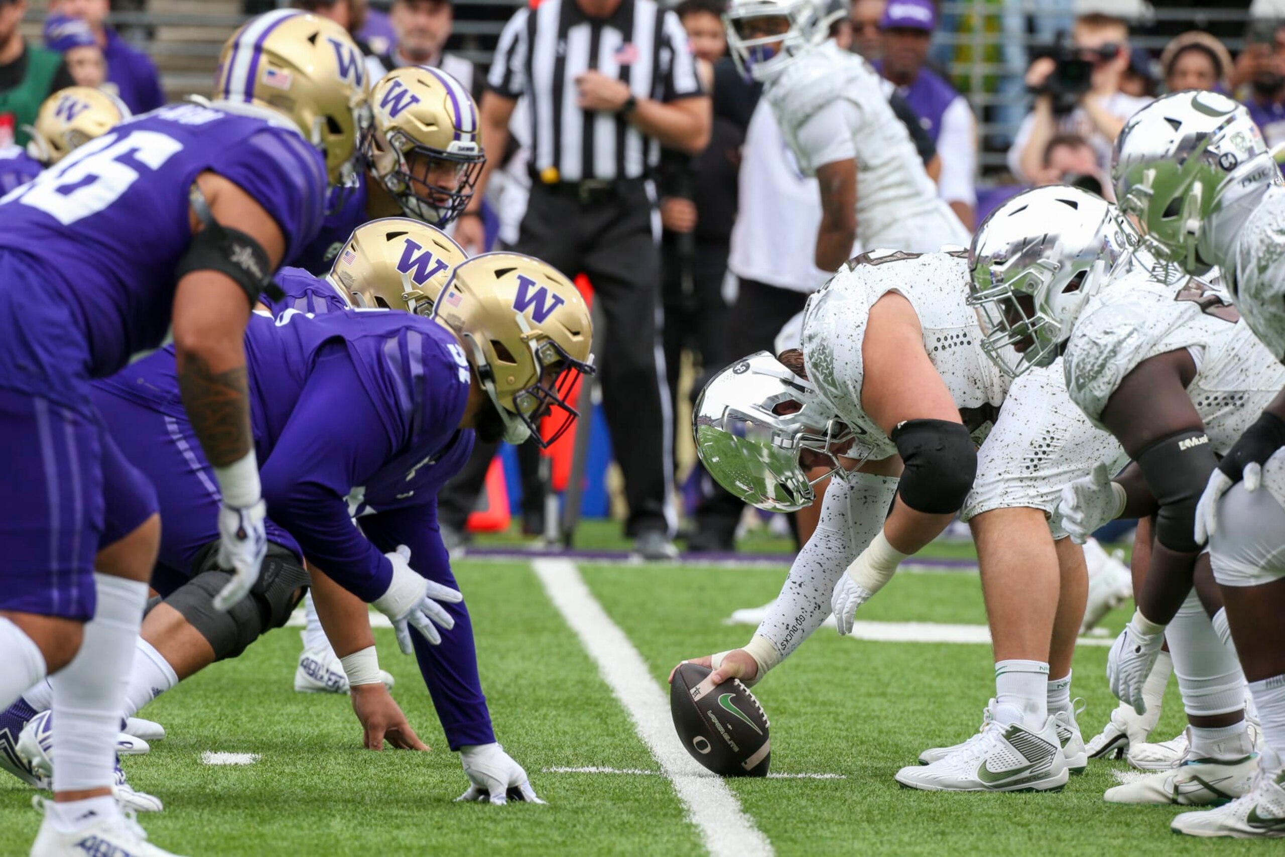 SEATTLE, WA - OCTOBER 14:  Offensive and defense players get set during a college football game between the Washington Huskies and the Oregon Ducks on October 14, 2023 at Husky Stadium in Seattle, WA. (Photo by Jesse Beals/Icon Sportswire via Getty Images)