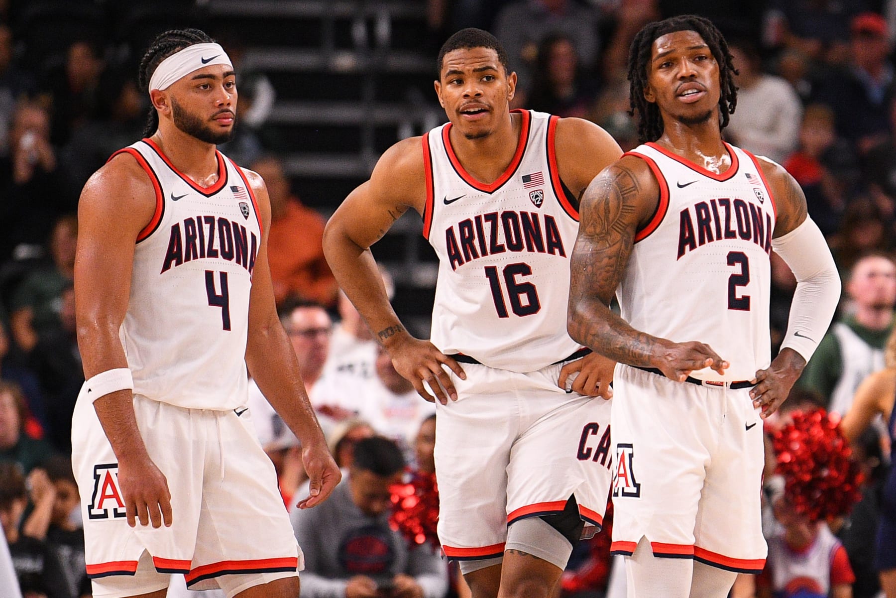 Arizona's Kylan Boswell, Keshad Johnson and Caleb Love
