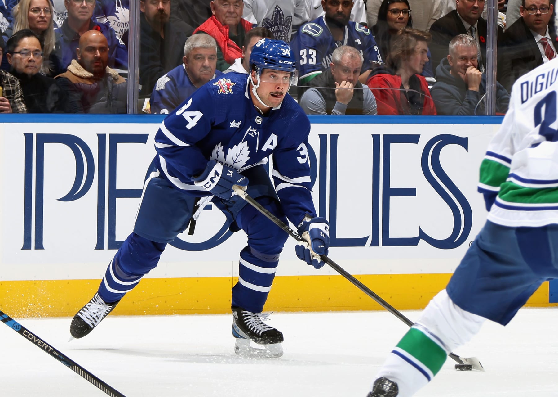 TORONTO, CANADA - NOVEMBER 11: Auston Matthews #34 of the Toronto Maple Leafs skates against the Vancouver Canucks at Scotiabank Arena on November 11, 2023 in Toronto, Ontario, Canada. (Photo by Bruce Bennett/Getty Images)