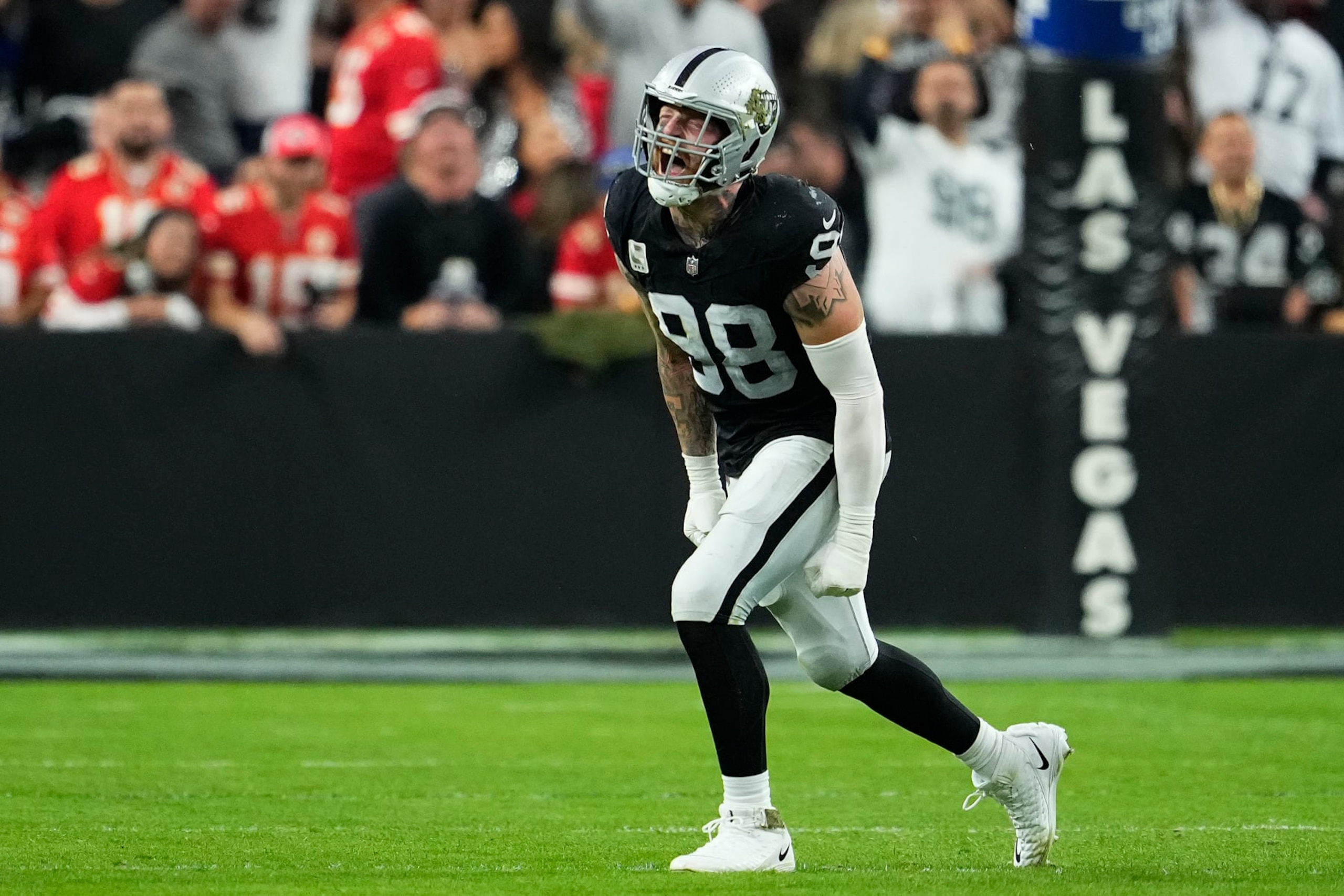 LAS VEGAS, NEVADA - NOVEMBER 26: Maxx Crosby #98 of the Las Vegas Raiders reacts after sacking Patrick Mahomes #15 of the Kansas City Chiefs during the third quarter at Allegiant Stadium on November 26, 2023 in Las Vegas, Nevada. (Photo by Jeff Bottari/Getty Images)