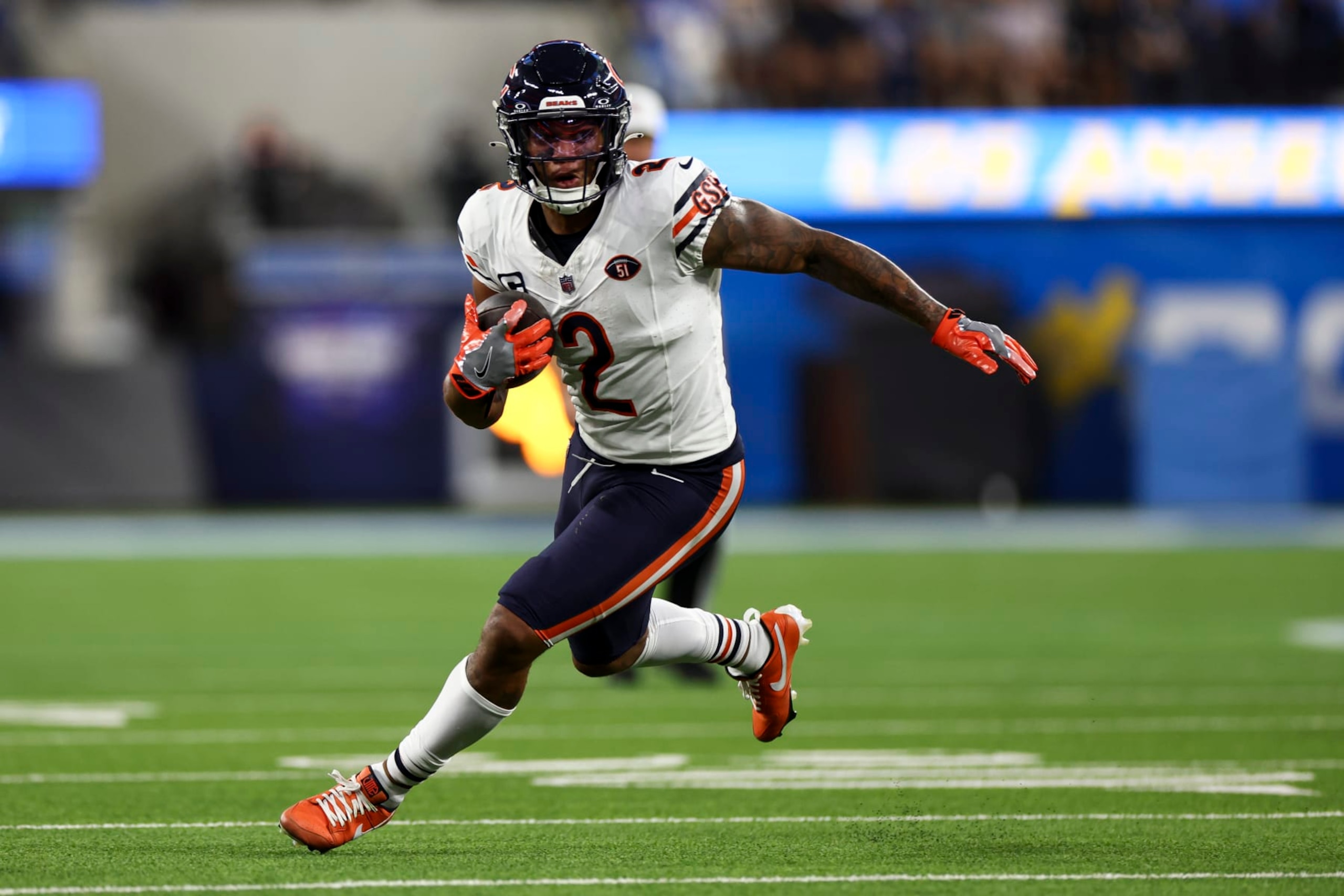 INGLEWOOD, CA - OCTOBER 29: DJ Moore #2 of the Chicago Bears carries the ball during the second quarter of an NFL football game against the Los Angeles Chargers at SoFi Stadium on October 29, 2023 in Inglewood, California. (Photo by Kevin Sabitus/Getty Images)