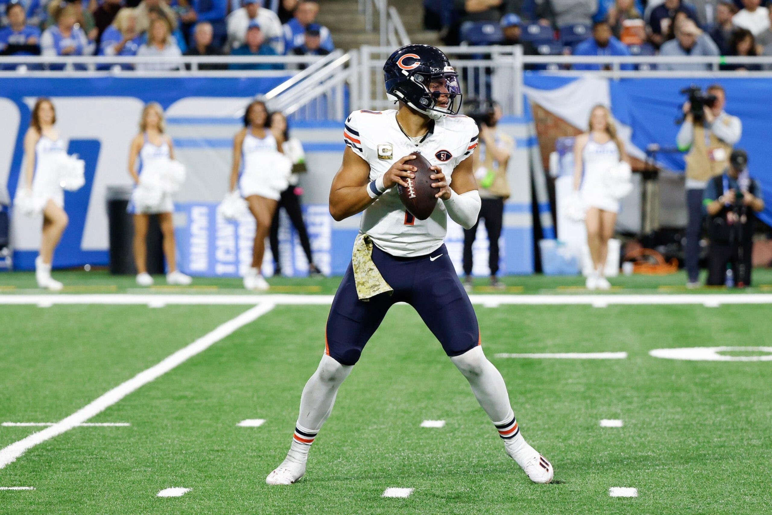 DETROIT, MICHIGAN - NOVEMBER 19: Justin Fields #1 of the Chicago Bears looks to throw the ball during a game against the Detroit Lions at Ford Field on November 19, 2023 in Detroit, Michigan. (Photo by Mike Mulholland/Getty Images)