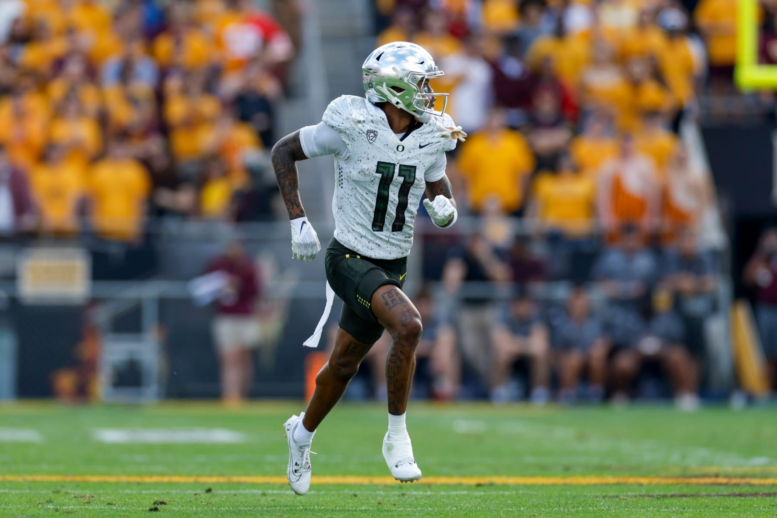 TEMPE, ARIZONA - NOVEMBER 18: Troy Franklin #11 of the Oregon Ducks runs a route during a game against the Arizona State Sun Devils at Mountain America Stadium on November 18, 2023 in Tempe, Arizona. (Photo by Brandon Sloter/Image Of Sport/Getty Images)