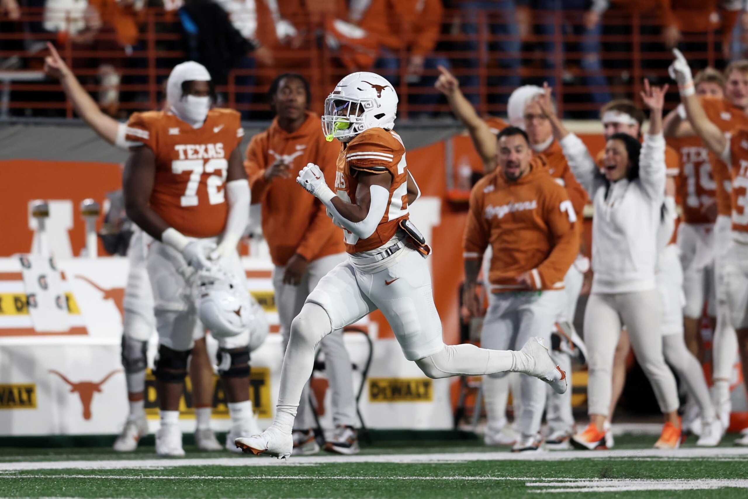 AUSTIN, TEXAS - NOVEMBER 24: Jaydon Blue #23 of the Texas Longhorns rushes for a touchdown in the first half against the Texas Tech Red Raiders at Darrell K Royal-Texas Memorial Stadium on November 24, 2023 in Austin, Texas. (Photo by Tim Warner/Getty Images)