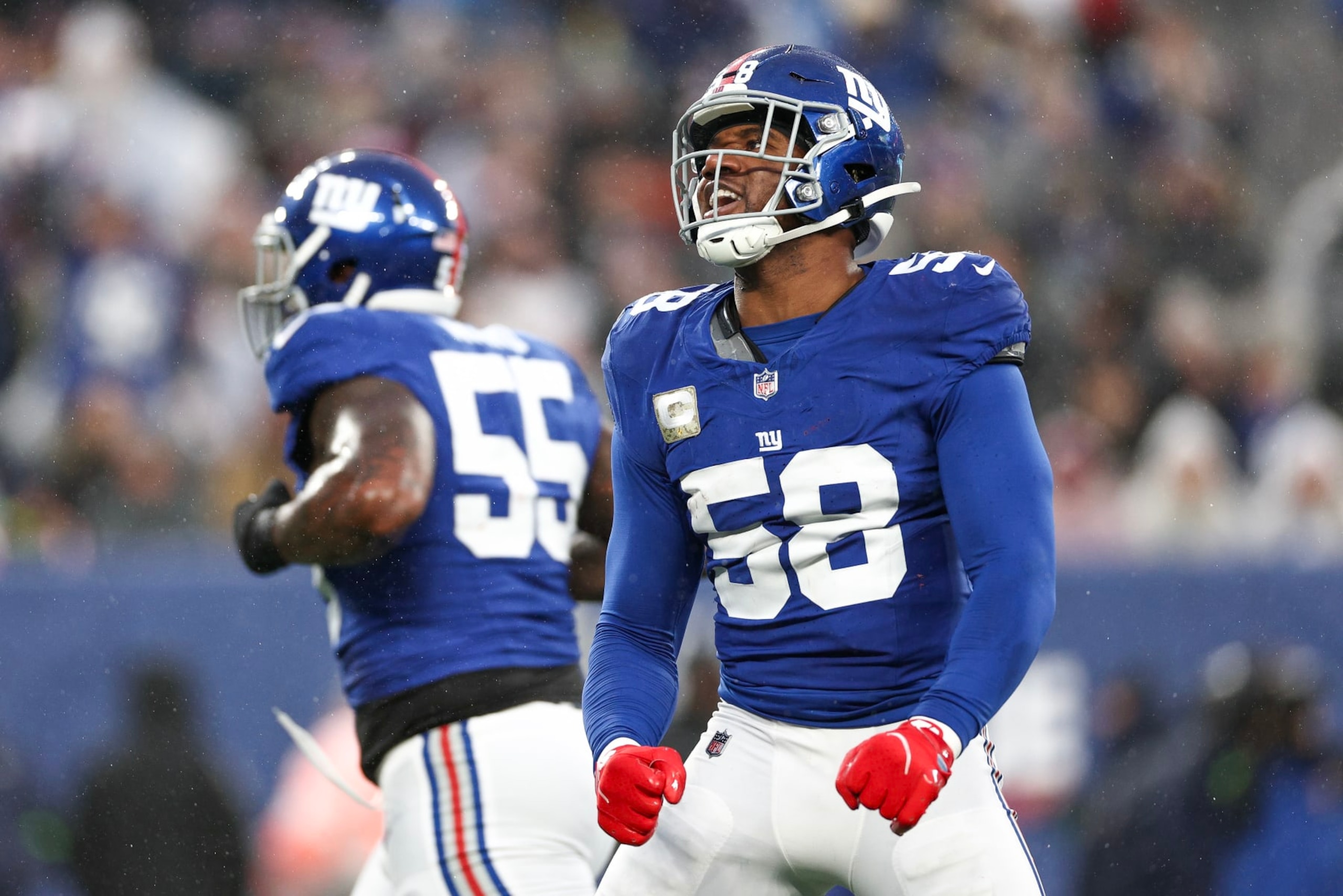 EAST RUTHERFORD, NEW JERSEY - NOVEMBER 26: Bobby Okereke #58 of the New York Giants celebrates after a sack during the fourth quarter against the New England Patriots at MetLife Stadium on November 26, 2023 in East Rutherford, New Jersey. (Photo by Elsa/Getty Images)