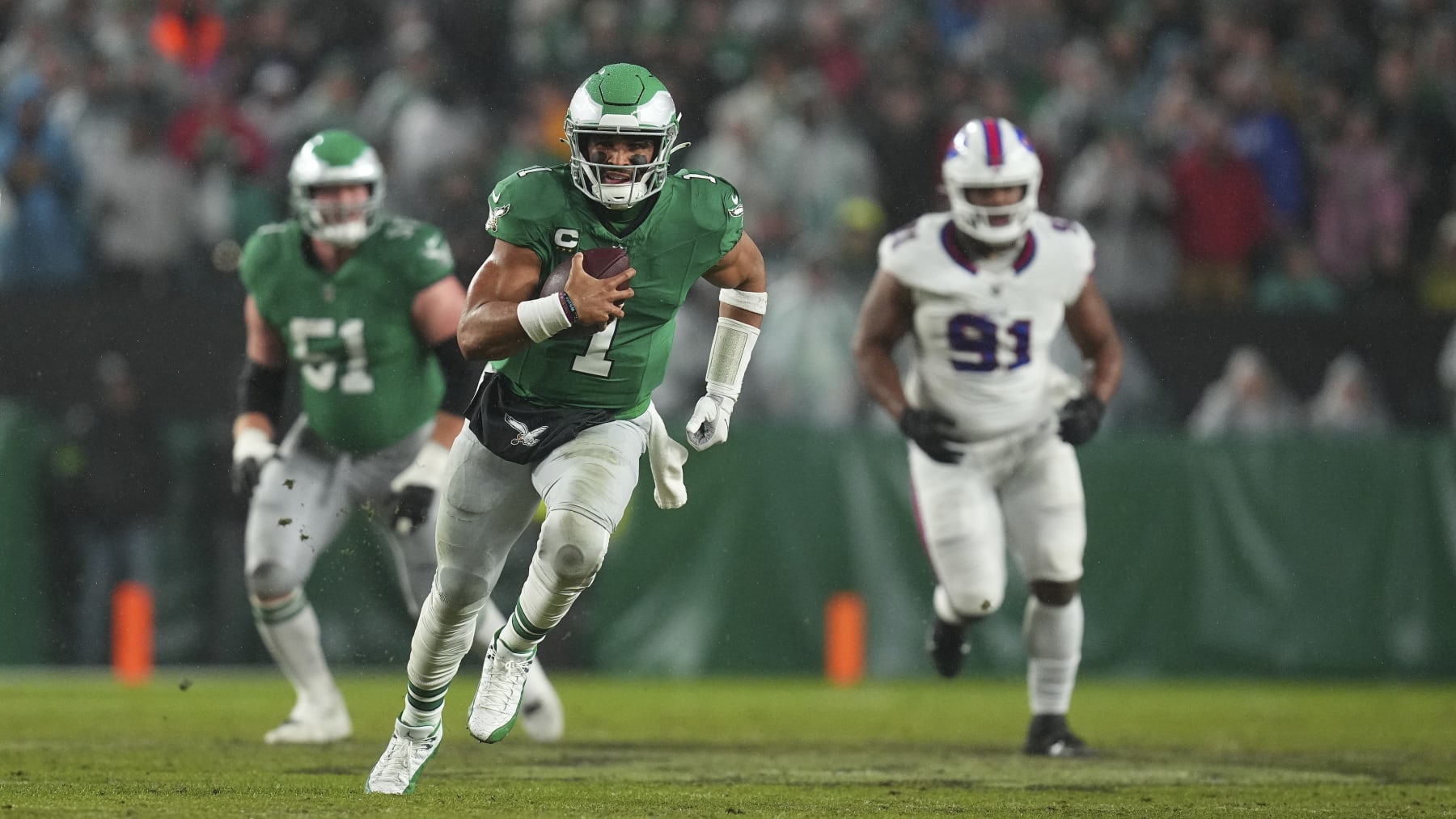PHILADELPHIA, PENNSYLVANIA - NOVEMBER 26: Jalen Hurts #1 of the Philadelphia Eagles runs with the ball against the Buffalo Bills at Lincoln Financial Field on November 26, 2023 in Philadelphia, Pennsylvania. (Photo by Mitchell Leff/Getty Images)
