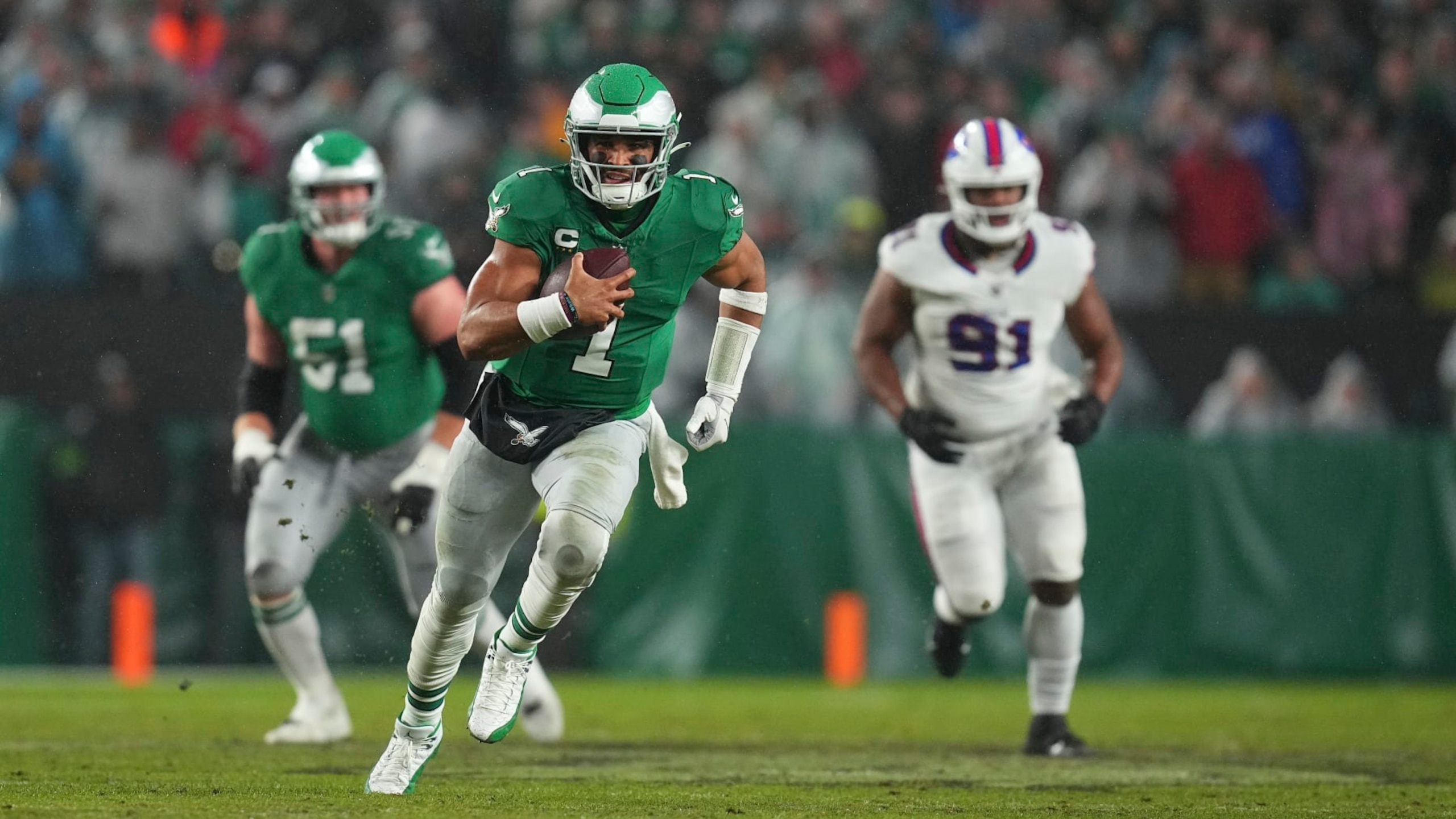 PHILADELPHIA, PENNSYLVANIA - NOVEMBER 26: Jalen Hurts #1 of the Philadelphia Eagles runs with the ball against the Buffalo Bills at Lincoln Financial Field on November 26, 2023 in Philadelphia, Pennsylvania. (Photo by Mitchell Leff/Getty Images)