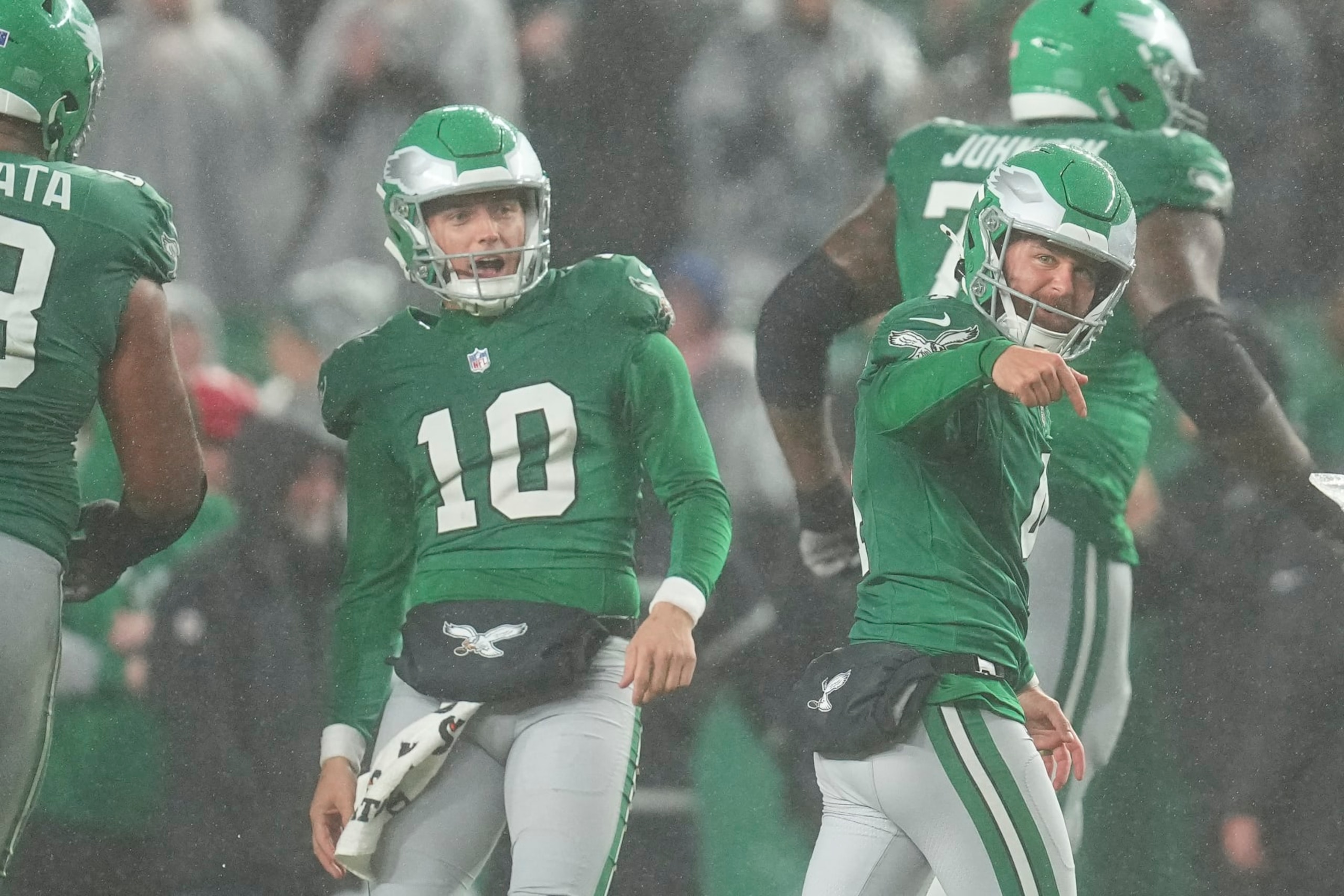 PHILADELPHIA, PENNSYLVANIA - NOVEMBER 26: Braden Mann #10 of the Philadelphia Eagles and Jake Elliott #4 of the Philadelphia Eagles react after Elliott's game tying field goal during the fourth quarter against the Buffalo Bills at Lincoln Financial Field on November 26, 2023 in Philadelphia, Pennsylvania. (Photo by Mitchell Leff/Getty Images)