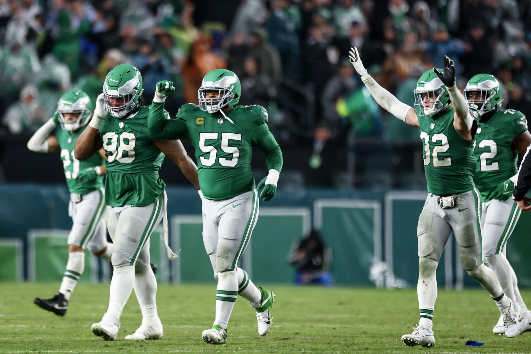 PHILADELPHIA, PENNSYLVANIA - NOVEMBER 26: Jalen Carter #98 of the Philadelphia Eagles, Brandon Graham #55 of the Philadelphia Eagles, and Reed Blankenship #32 of the Philadelphia Eagles react after a play during the third quarter against the Buffalo Bills at Lincoln Financial Field on November 26, 2023 in Philadelphia, Pennsylvania. (Photo by Tim Nwachukwu/Getty Images)