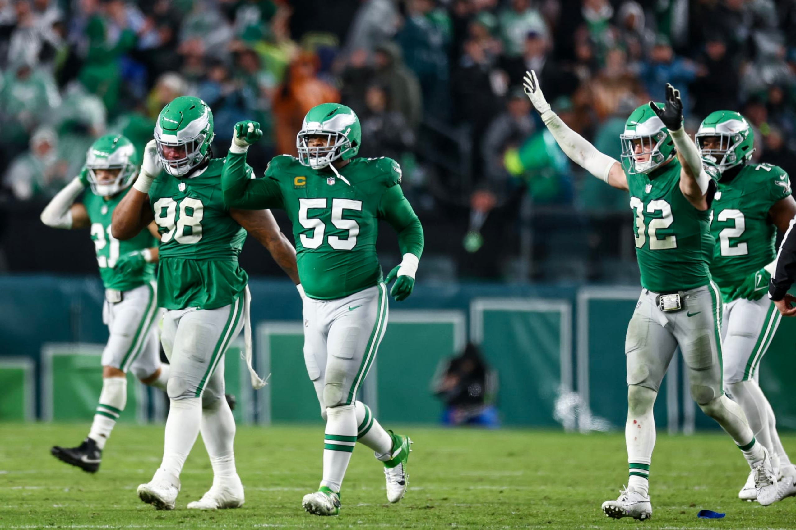 PHILADELPHIA, PENNSYLVANIA - NOVEMBER 26: Jalen Carter #98 of the Philadelphia Eagles, Brandon Graham #55 of the Philadelphia Eagles, and Reed Blankenship #32 of the Philadelphia Eagles react after a play during the third quarter against the Buffalo Bills at Lincoln Financial Field on November 26, 2023 in Philadelphia, Pennsylvania. (Photo by Tim Nwachukwu/Getty Images)