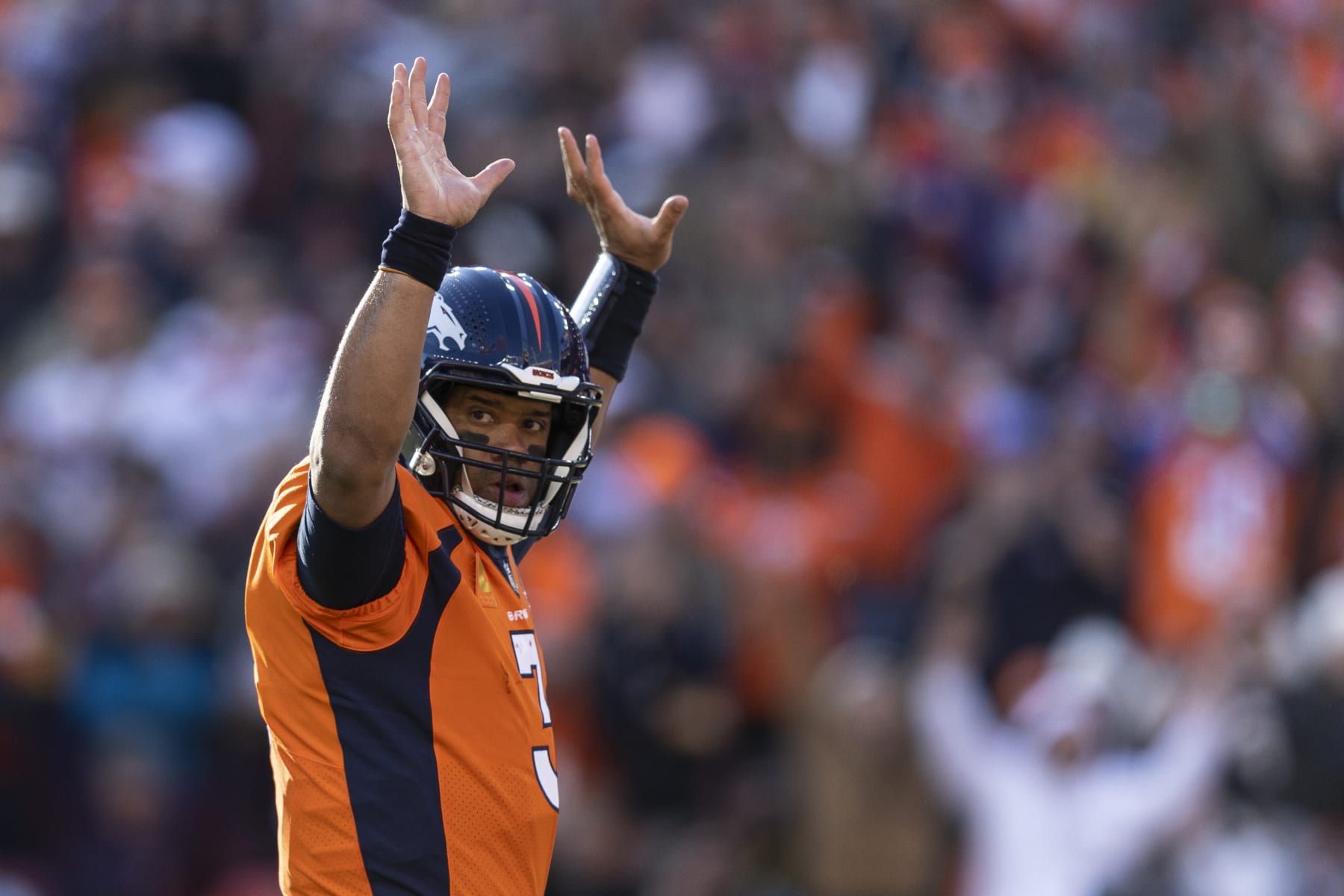 DENVER, COLORADO - NOVEMBER 26: Russell Wilson #3 of the Denver Broncos celebrates after a touchdown during an NFL football game between the Denver Broncos and the Cleveland Browns at Empower Field At Mile High on November 26, 2023 in Denver, Colorado. (Photo by Michael Owens/Getty Images)