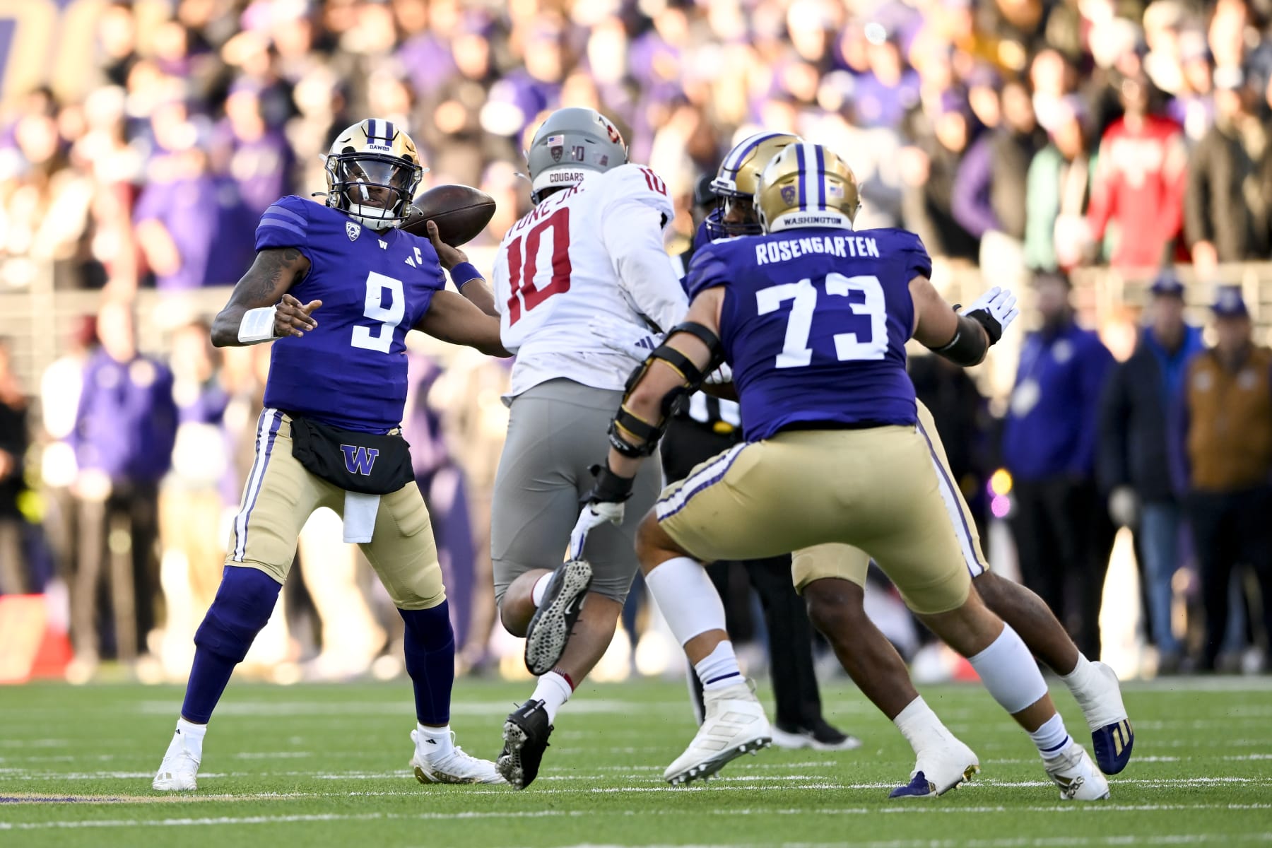 SEATTLE, WASHINGTON - NOVEMBER 25: Michael Penix Jr. #9 of the Washington Huskies throws the ball during the second quarter against the Washington State Cougars  at Husky Stadium on November 25, 2023 in Seattle, Washington. (Photo by Alika Jenner/Getty Images)