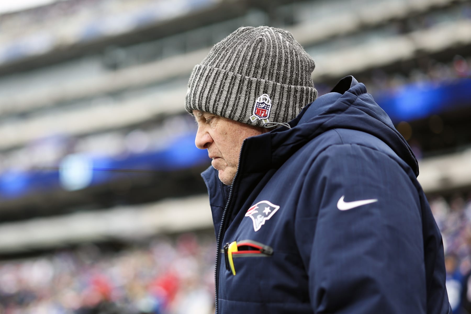 EAST RUTHERFORD, NEW JERSEY - NOVEMBER 26: Head coach Bill Belichick of the New England Patriots looks on prior to a game against the New York Giants at MetLife Stadium on November 26, 2023 in East Rutherford, New Jersey. (Photo by Elsa/Getty Images)