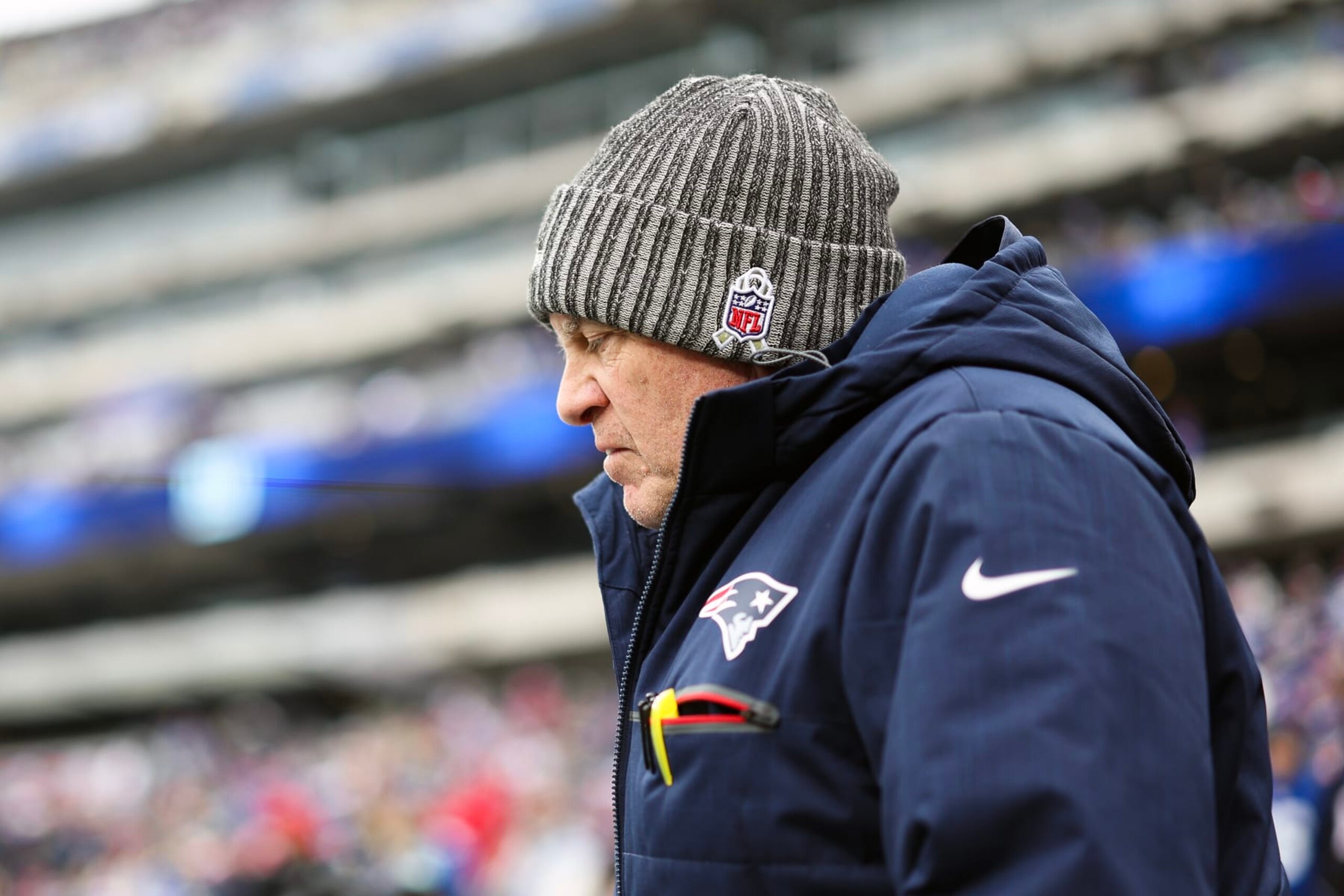 EAST RUTHERFORD, NEW JERSEY - NOVEMBER 26: Head coach Bill Belichick of the New England Patriots looks on prior to a game against the New York Giants at MetLife Stadium on November 26, 2023 in East Rutherford, New Jersey. (Photo by Elsa/Getty Images) EAST RUTHERFORD, NEW JERSEY - NOVEMBER 26: Head coach Bill Belichick of the New England Patriots looks on prior to a game against the New York Giants at MetLife Stadium on November 26, 2023 in East Rutherford, New Jersey. (Photo by Elsa/Getty Images)