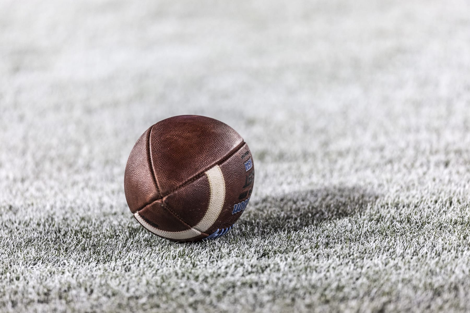 PALO ALTO, CA - OCTOBER 21:  A detail view of a football on the field at Stanford Stadium  during a Pac-12 NCAA college football game between the UCLA Bruins and the Stanford Cardinal on October 21, 2023 at Stanford Stadium in Palo Alto, California.  (Photo by David Madison/Getty Images)