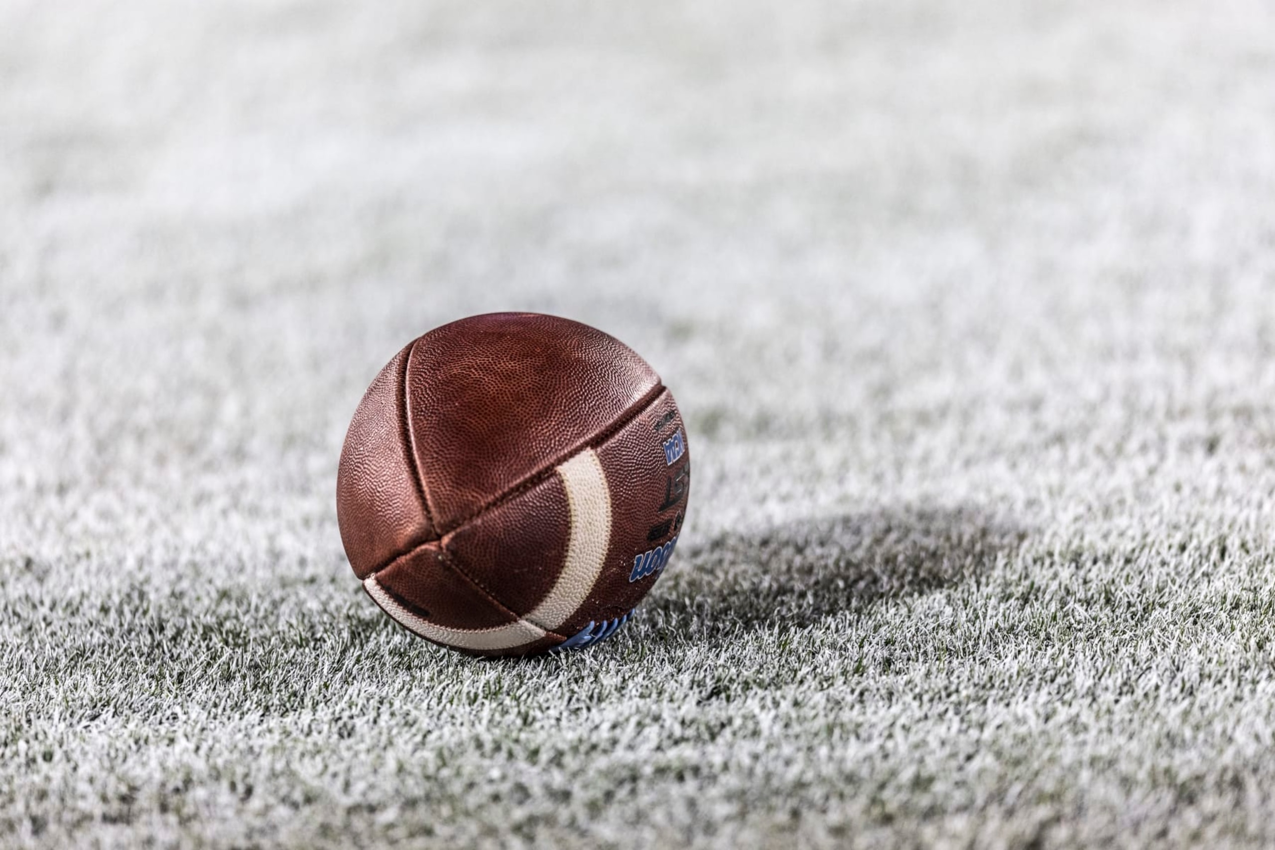 PALO ALTO, CA - OCTOBER 21:  A detail view of a football on the field at Stanford Stadium  during a Pac-12 NCAA college football game between the UCLA Bruins and the Stanford Cardinal on October 21, 2023 at Stanford Stadium in Palo Alto, California.  (Photo by David Madison/Getty Images)