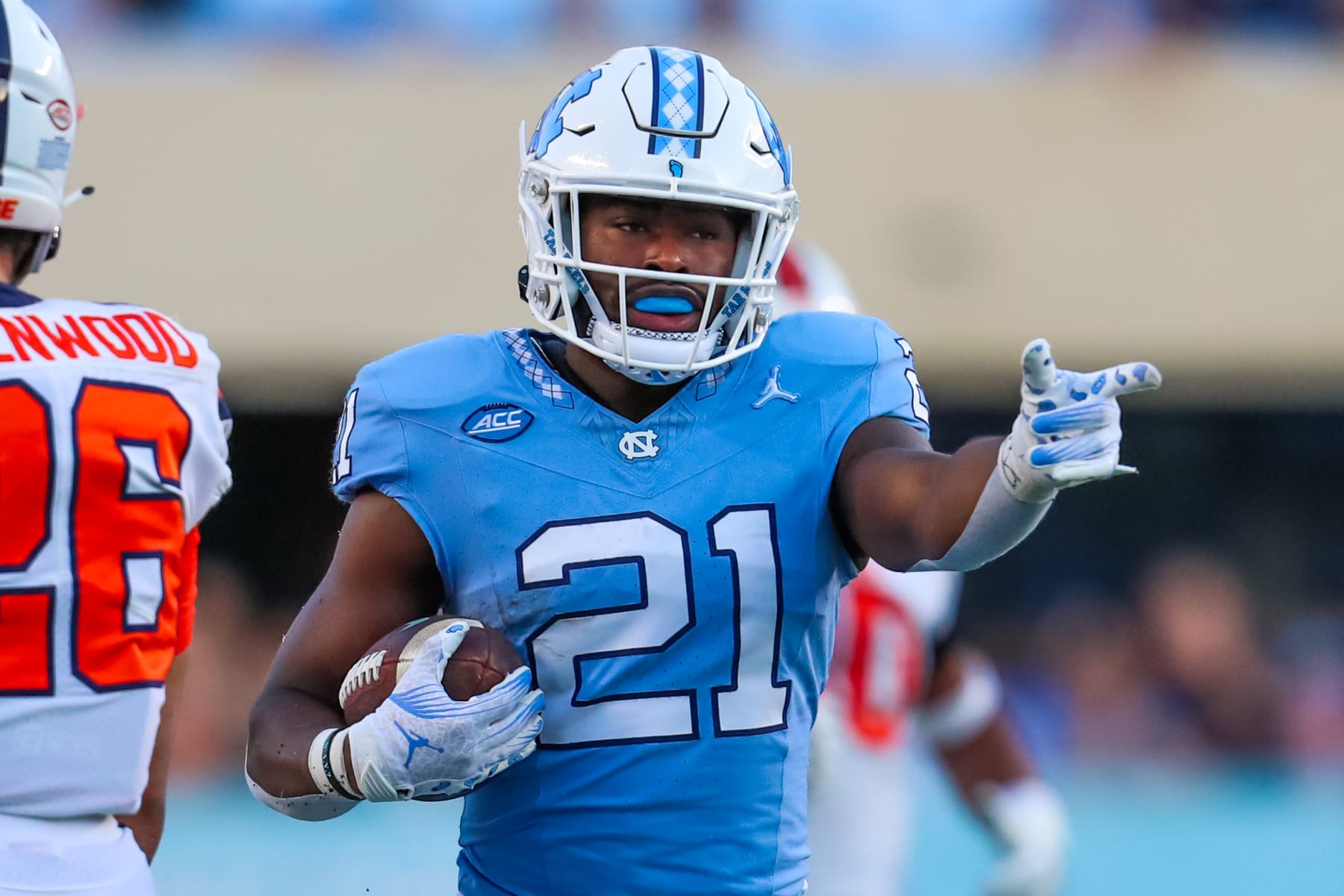 CHAPEL HILL, NC - OCTOBER 07: Elijah Green #21 of the North Carolina Tar Heels signals for a first down during a football game against the Syracuse Orange at Kenan Memorial Stadium in Chapel Hill, North Carolina on Oct 7, 2023. (Photo by David Jensen/Icon Sportswire via Getty Images)