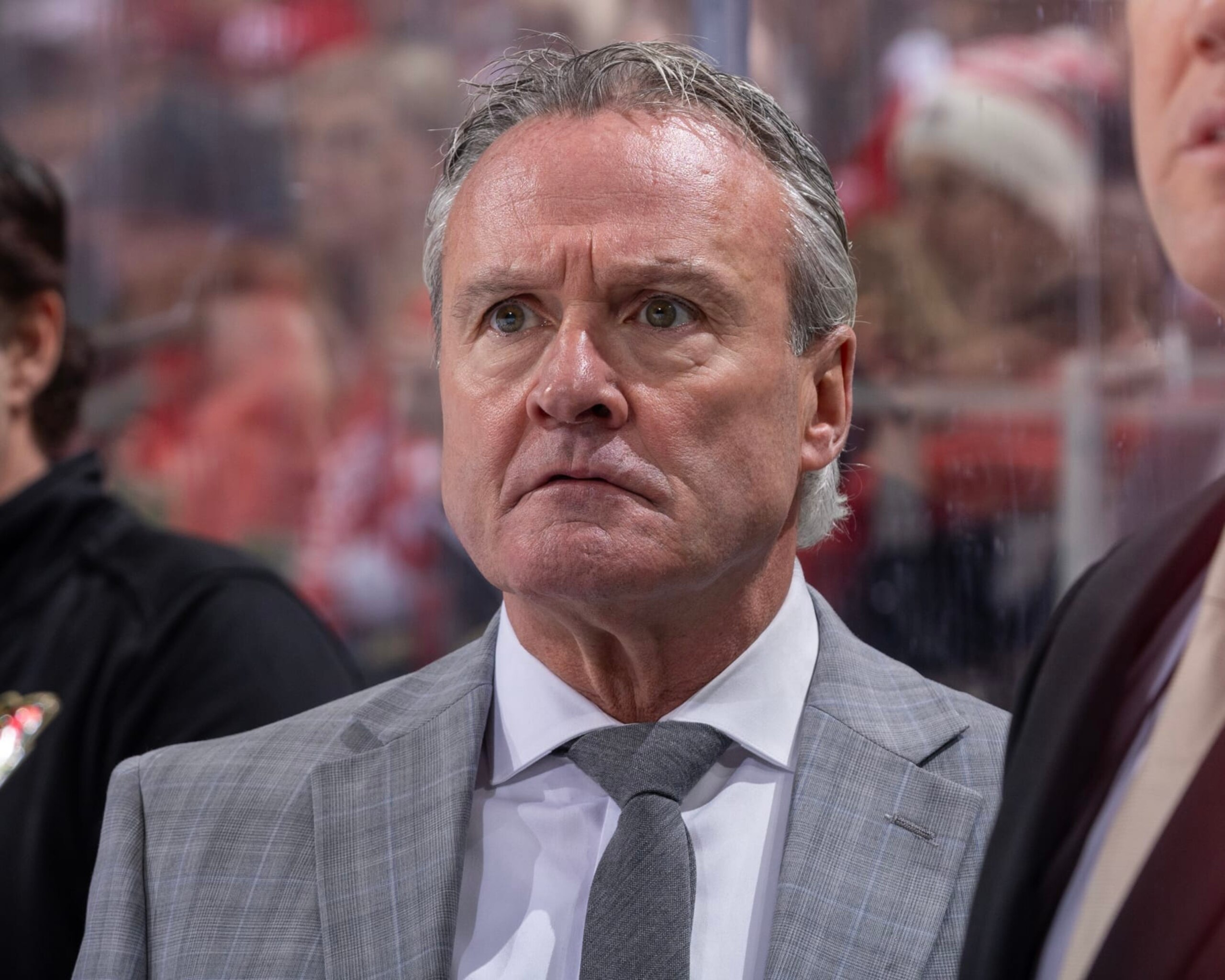DETROIT, MI - NOVEMBER 26: Head coach Dean Evason of the Minnesota Wild following the play against the Detroit Red Wings during the first period at Little Caesars Arena on November 26, 2023 in Detroit, Michigan. (Photo by Dave Reginek/NHLI via Getty Images) DETROIT, MI - NOVEMBER 26: Head coach Dean Evason of the Minnesota Wild following the play against the Detroit Red Wings during the first period at Little Caesars Arena on November 26, 2023 in Detroit, Michigan. (Photo by Dave Reginek/NHLI via Getty Images)