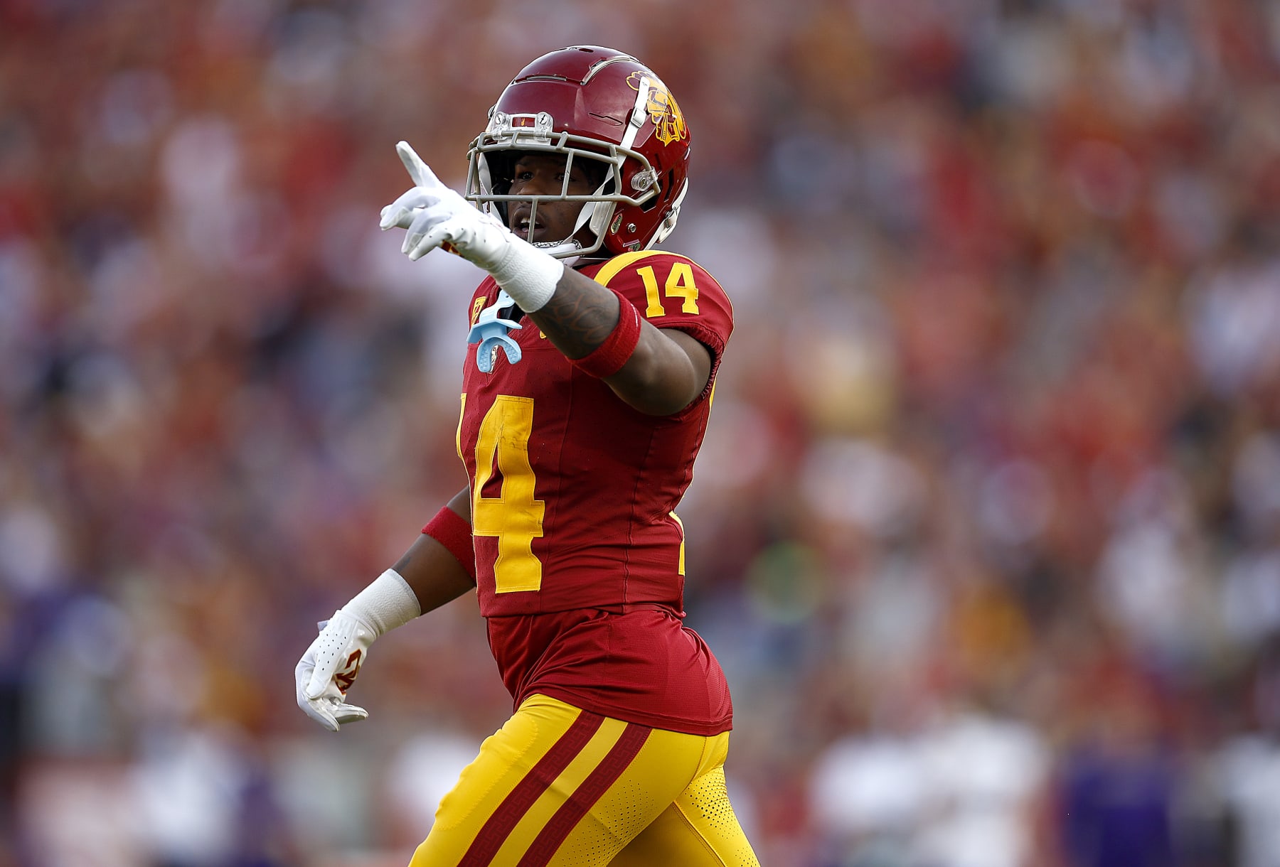 LOS ANGELES, CALIFORNIA - NOVEMBER 04:  Raleek Brown #14 of the USC Trojans celebrates a touchdown against the Washington Huskies in the first quarter at United Airlines Field at the Los Angeles Memorial Coliseum on November 04, 2023 in Los Angeles, California. (Photo by Ronald Martinez/Getty Images)