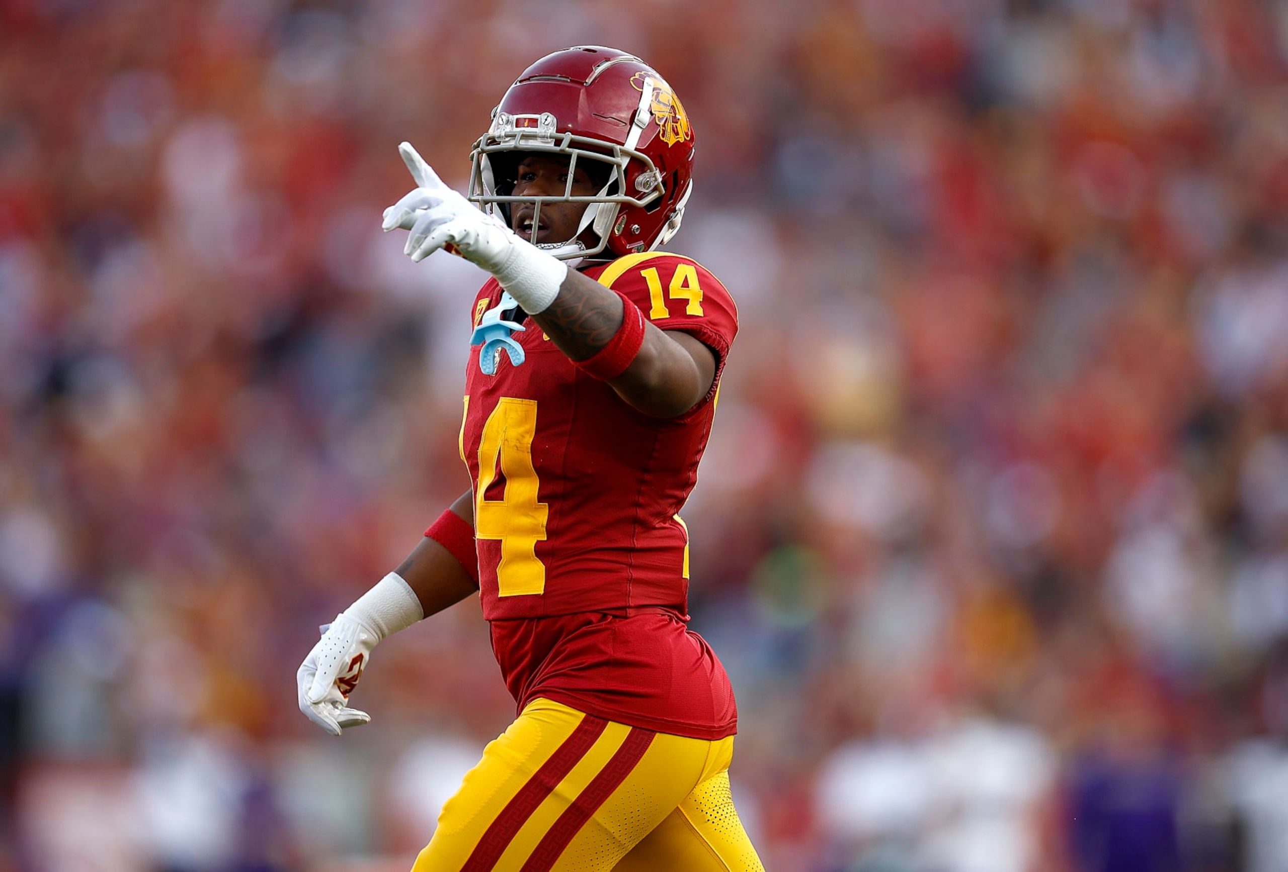 LOS ANGELES, CALIFORNIA - NOVEMBER 04:  Raleek Brown #14 of the USC Trojans celebrates a touchdown against the Washington Huskies in the first quarter at United Airlines Field at the Los Angeles Memorial Coliseum on November 04, 2023 in Los Angeles, California. (Photo by Ronald Martinez/Getty Images)