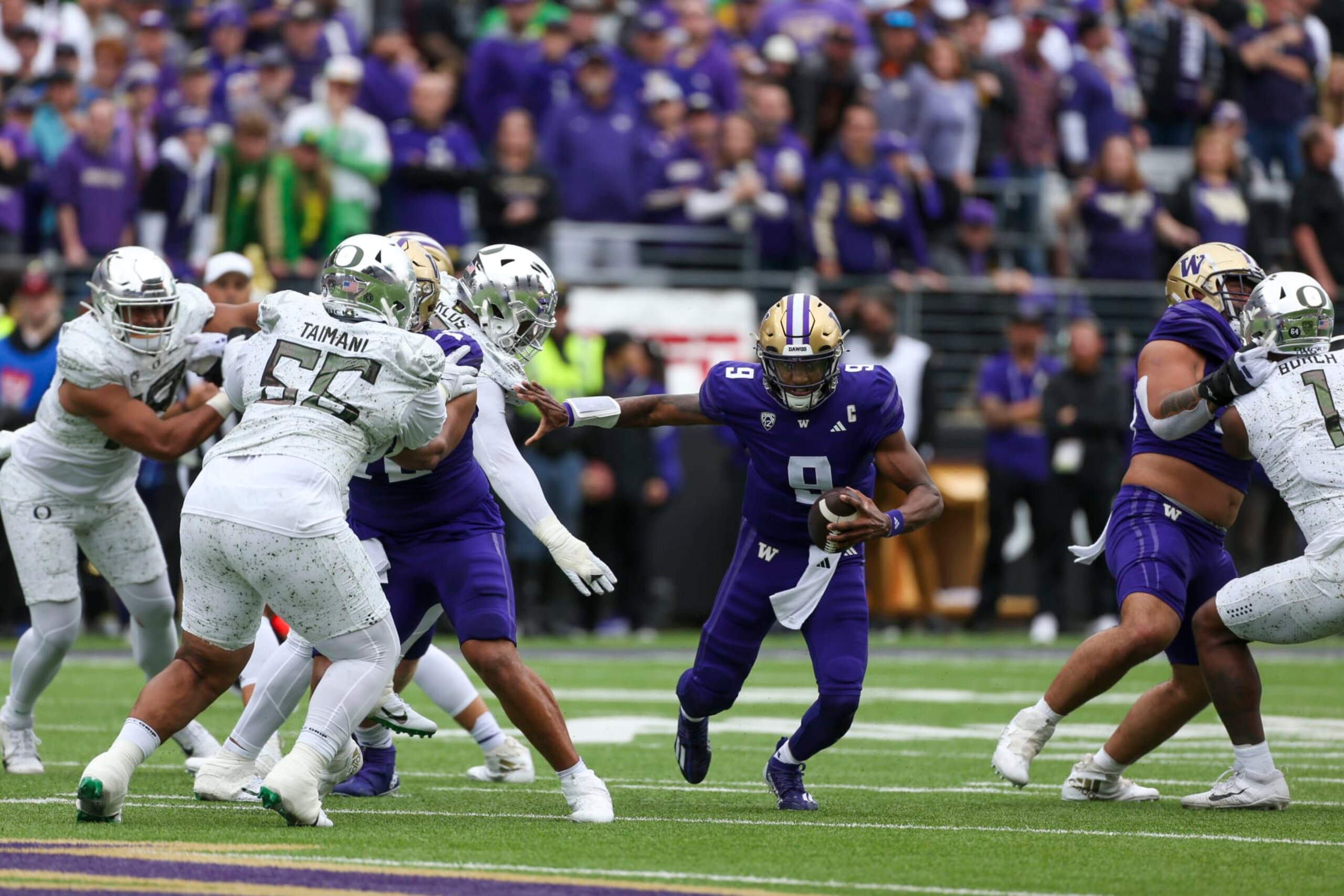 SEATTLE, WA - OCTOBER 14: Washington (QB) #9 Michael Penix jr races through a hole during the college football game between the Washington Huskies and the Oregon Ducks on October 14, 2023, at Husky Stadium in Seattle, WA. (Photo by Jesse Beals/Icon Sportswire via Getty Images) SEATTLE, WA - OCTOBER 14: Washington (QB) #9 Michael Penix jr races through a hole during the college football game between the Washington Huskies and the Oregon Ducks on October 14, 2023, at Husky Stadium in Seattle, WA. (Photo by Jesse Beals/Icon Sportswire via Getty Images)