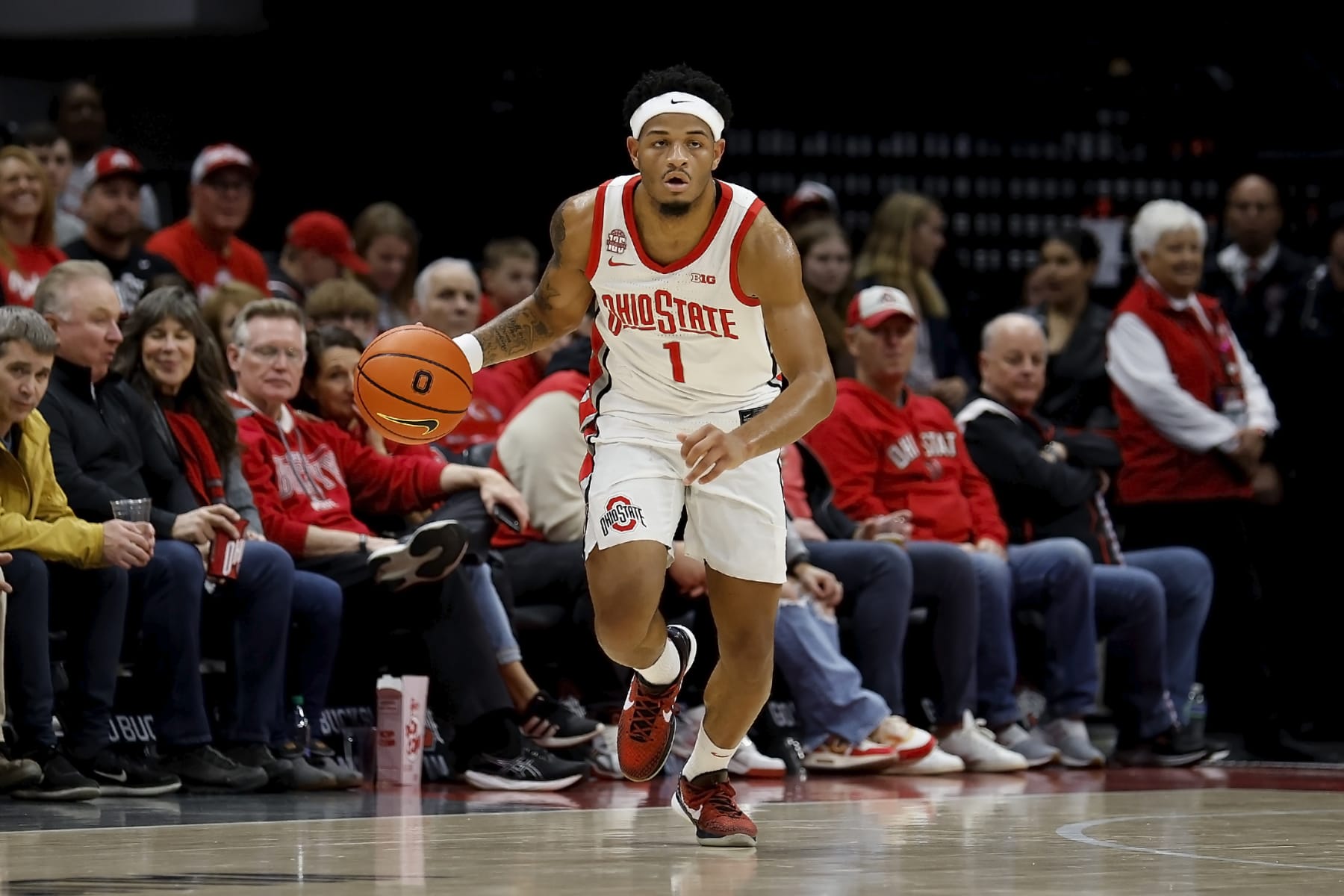 COLUMBUS, OHIO - NOVEMBER 10:  Roddy Gayle Jr. #1 of the Ohio State Buckeyes moves the ball up the court during the game against the Texas A&M Aggies at Value City Arena on November 10, 2023 in Columbus, Ohio. (Photo by Kirk Irwin/Getty Images)