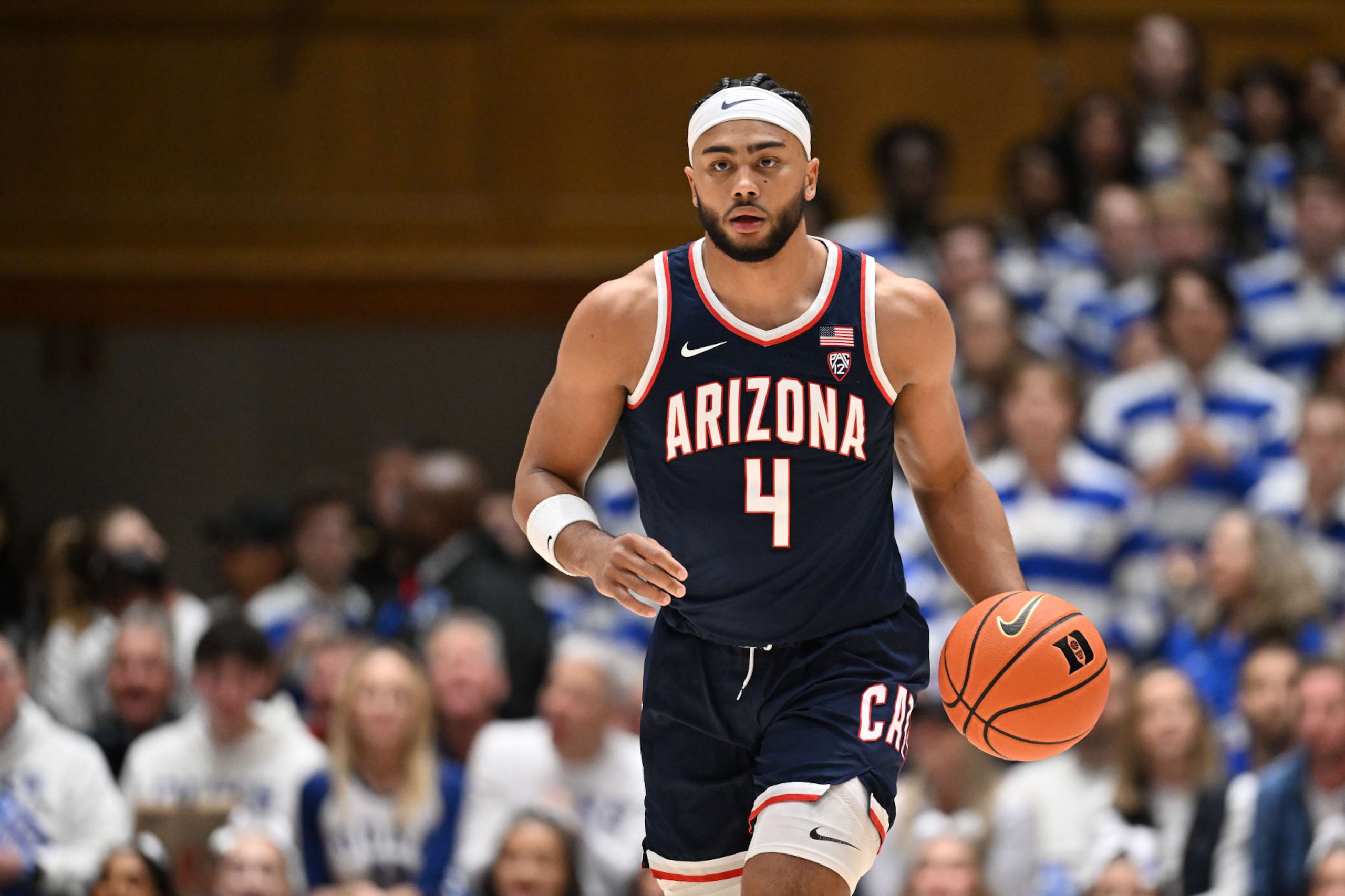 DURHAM, NORTH CAROLINA - NOVEMBER 10: Kylan Boswell #4 of the Arizona Wildcats moves the ball against the Duke Blue Devils during the game at Cameron Indoor Stadium on November 10, 2023 in Durham, North Carolina. Arizona won 78-73. (Photo by Grant Halverson/Getty Images)
