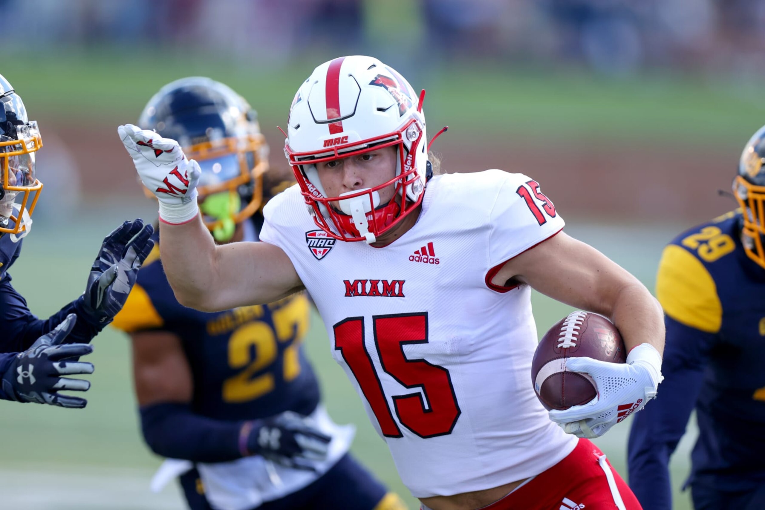 KENT, OH - SEPTEMBER 30: Miami RedHawks wide receiver Cade McDonald (15) scores on a 32-yard touchdown catch during the first quarter of the college football game between the Miami (OH) RedHawks and and Kent State Golden Flashes on September 30, 2023, at Dix Stadium in Kent, OH.  (Photo by Frank Jansky/Icon Sportswire via Getty Images)