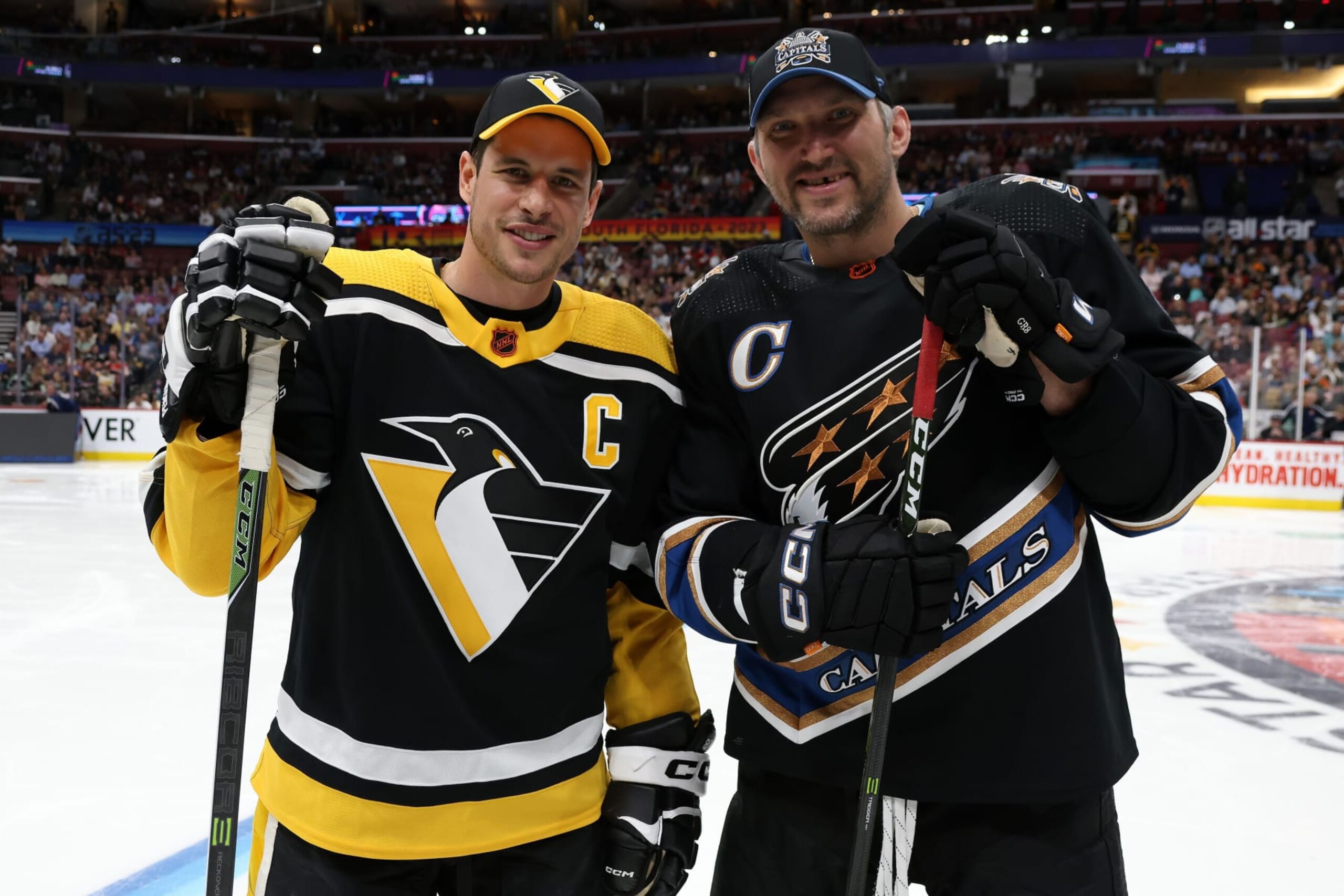 SUNRISE, FLORIDA - FEBRUARY 03: (L-R) Sidney Crosby #87 of the Pittsburgh Penguins and Alex Ovechkin #8 of the Washington Capitals pose for a photo during the Great Clips NHL Breakaway Challenge event during the 2023 NHL All-Star Skills Competition at FLA Live Arena on February 03, 2023 in Sunrise, Florida. (Photo by Dave Sandford/NHLI via Getty Images)