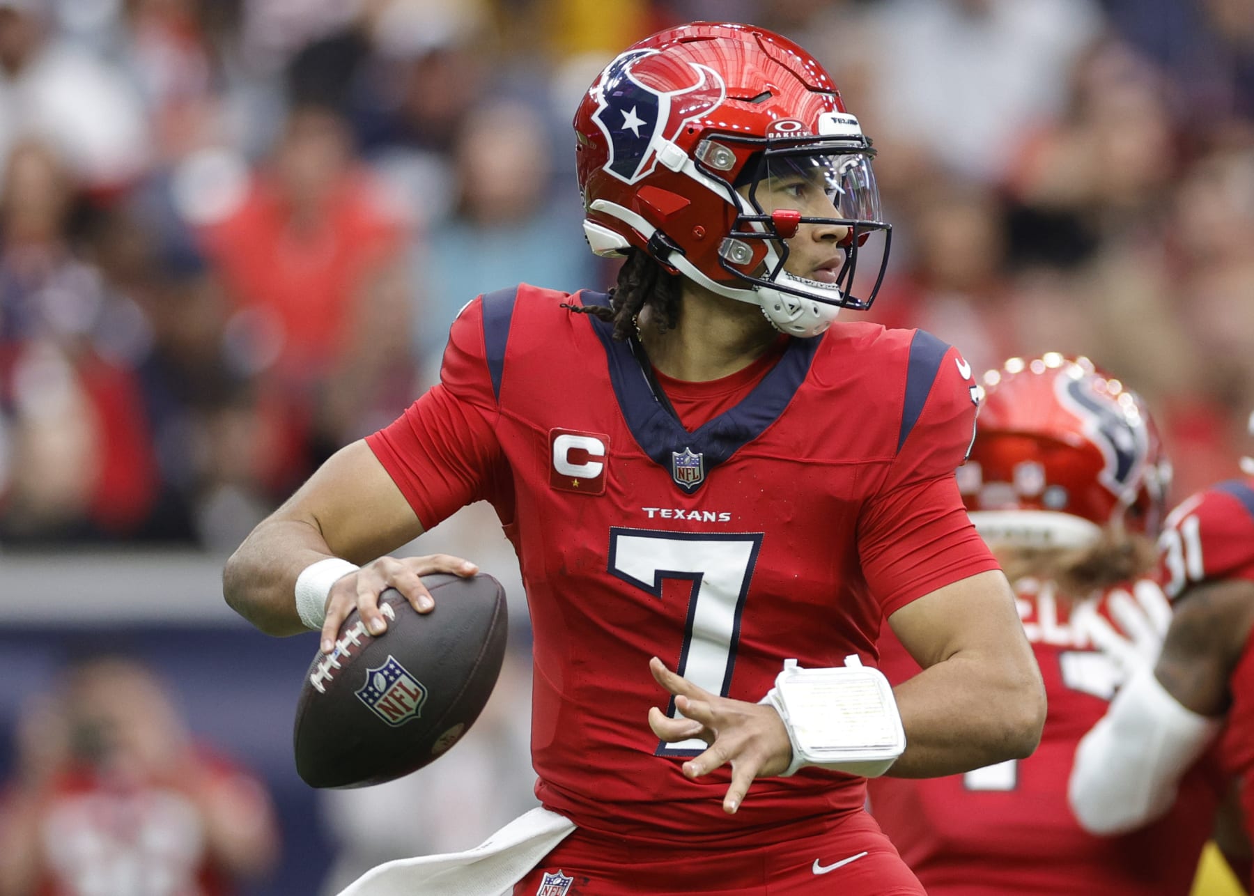 HOUSTON, TEXAS - NOVEMBER 26: C.J. Stroud #7 of the Houston Texans in action against the Jacksonville Jaguars at NRG Stadium on November 26, 2023 in Houston, Texas. (Photo by Carmen Mandato/Getty Images)